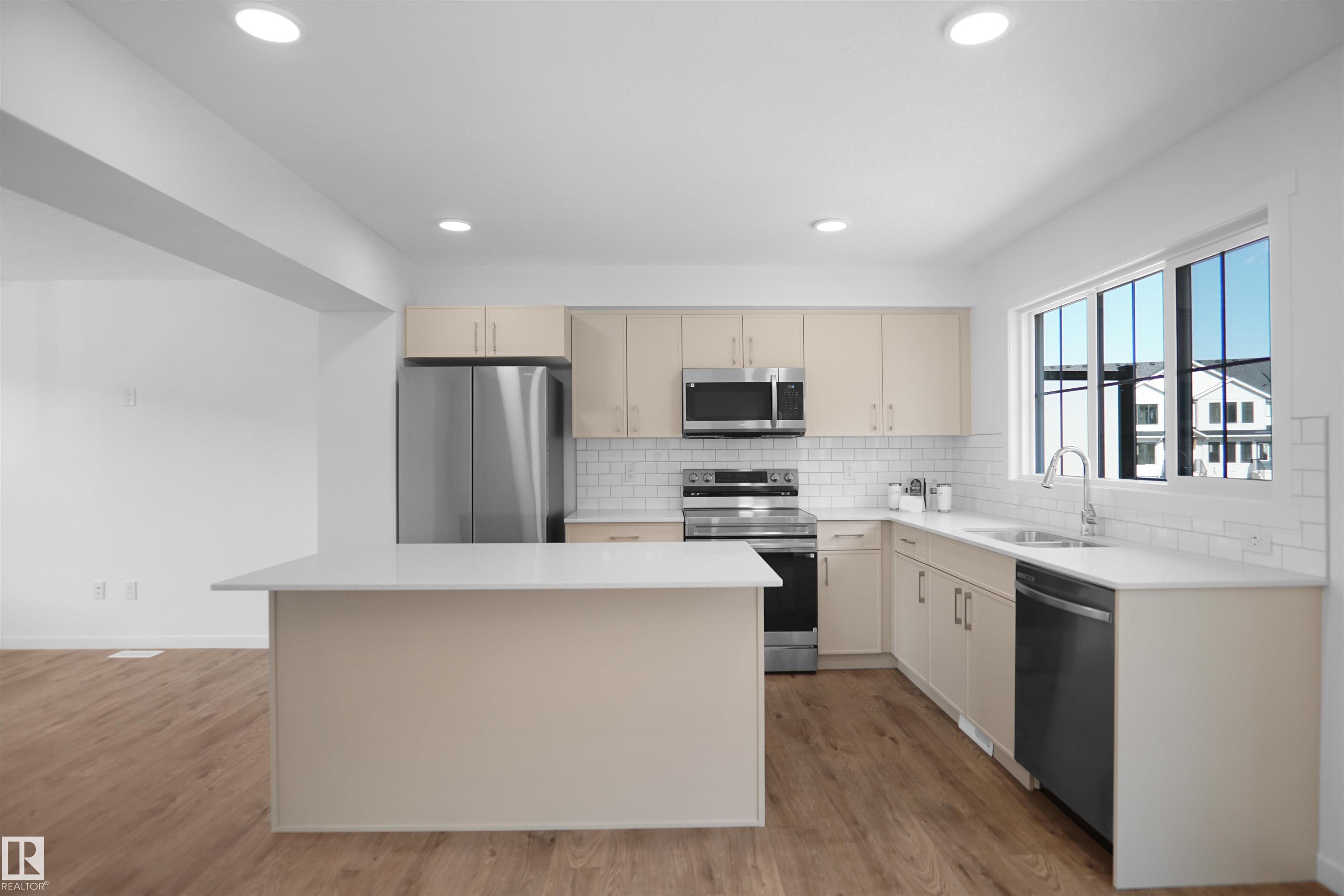 Photo 10 at 53 - 525 Secord Boulevard NW, Secord, Edmonton