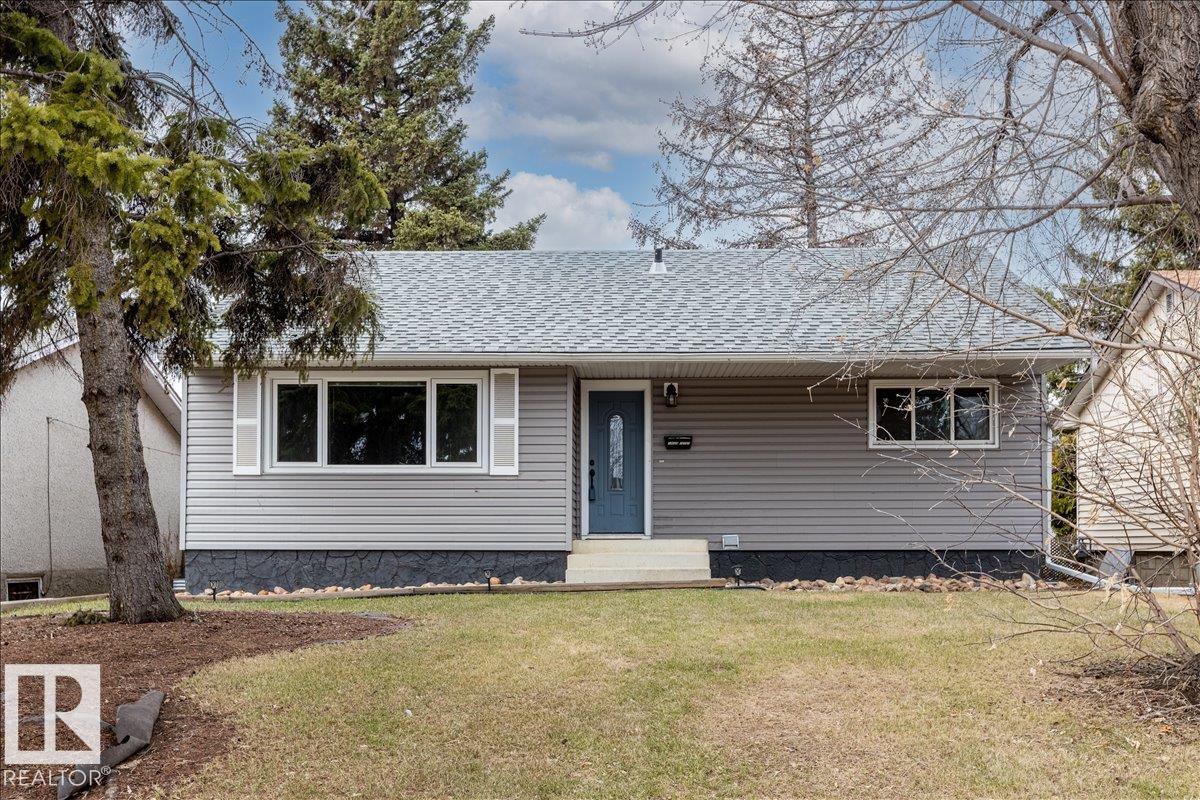 LEGALLY SUITED 3 bedroom up 2 bedroom down, with a SIDE entrance, and a double car garage, fully renovated in 2019, with large spacious kitchens including all stainless steel appliances, an adorable built in kitchen nook, and quartz countertops! Located on a quiet street with upgraded shingles (garage & house), all vinyl windows including the basement, 2 high efficiency furnaces, nicely painted stucco and vinyl siding, a recently redone backyard fence, garage door, newer blinds throughout and TWO laundry rooms, with brand new washer dryers (2026), this house is truly turnkey! Located on a large lot in the quiet Wellington neighborhood, with quick access to the many shops and bus routes along 137th avenue and the Yellowhead! Move into the upstairs unit, while renting the basement, or cash flow this well maintained property while the neighborhood continues to improve!