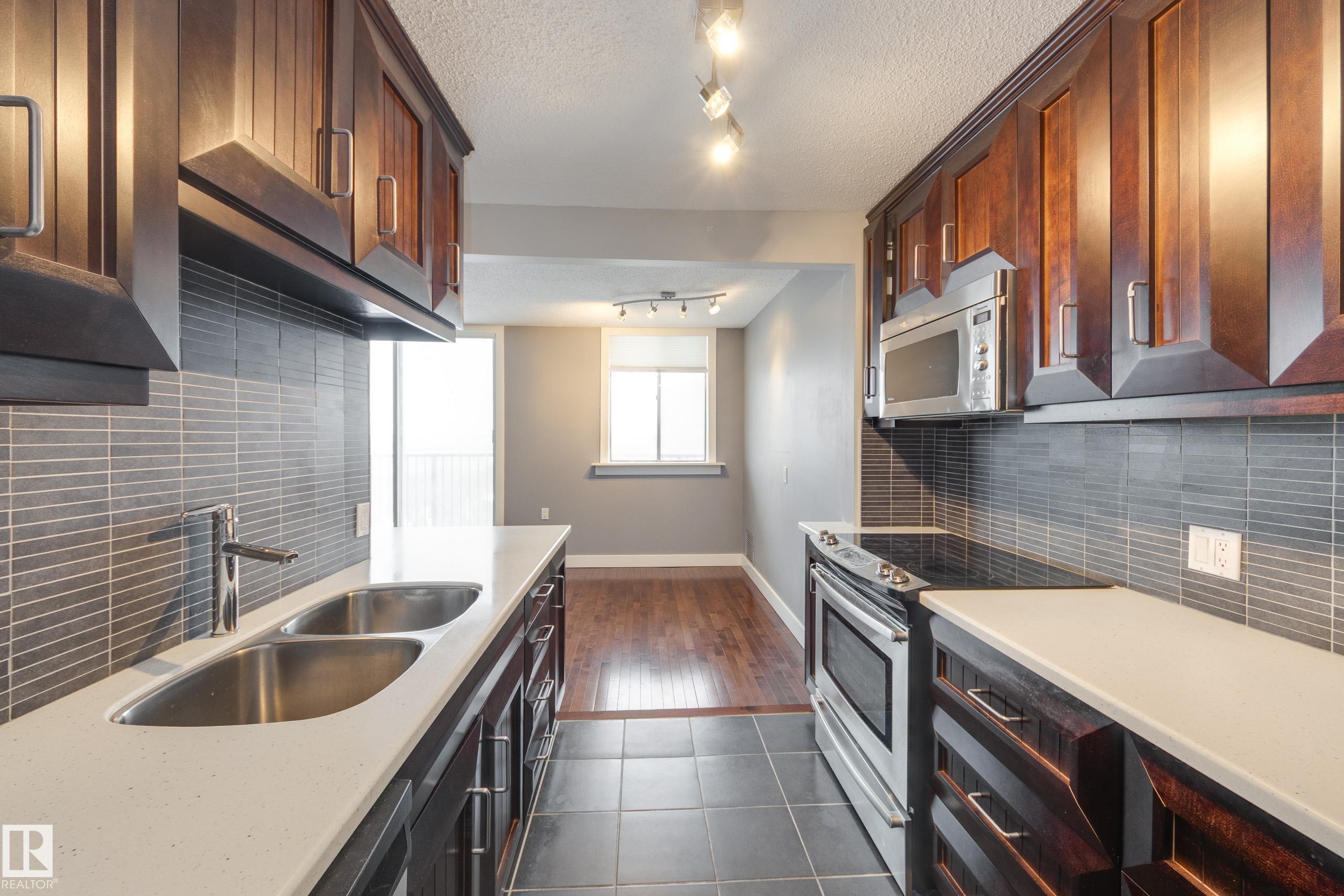 Photo 20 at 702 - 11307 99 Avenue NW, Wîhkwêntôwin, Edmonton