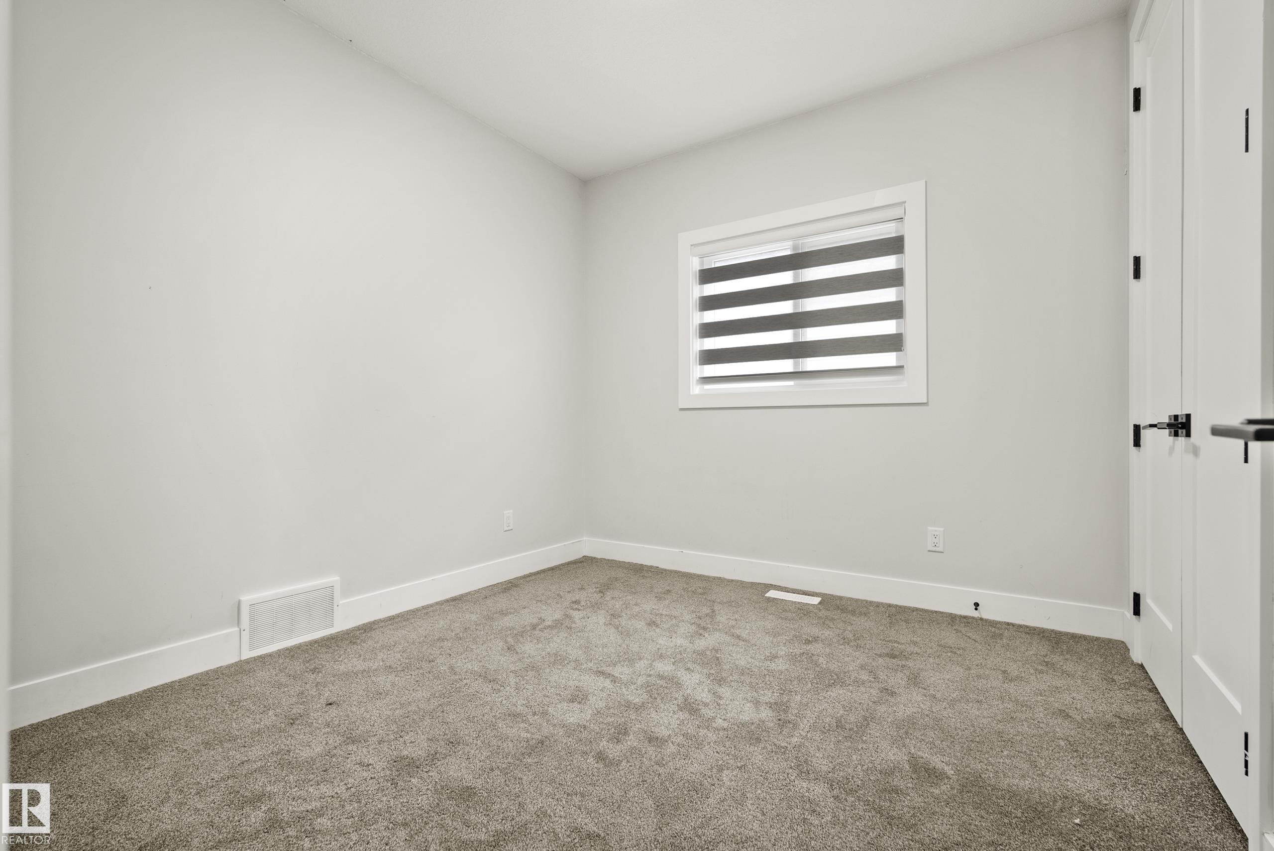 Photo 32 at 15031 10 Street NW, Fraser, Edmonton