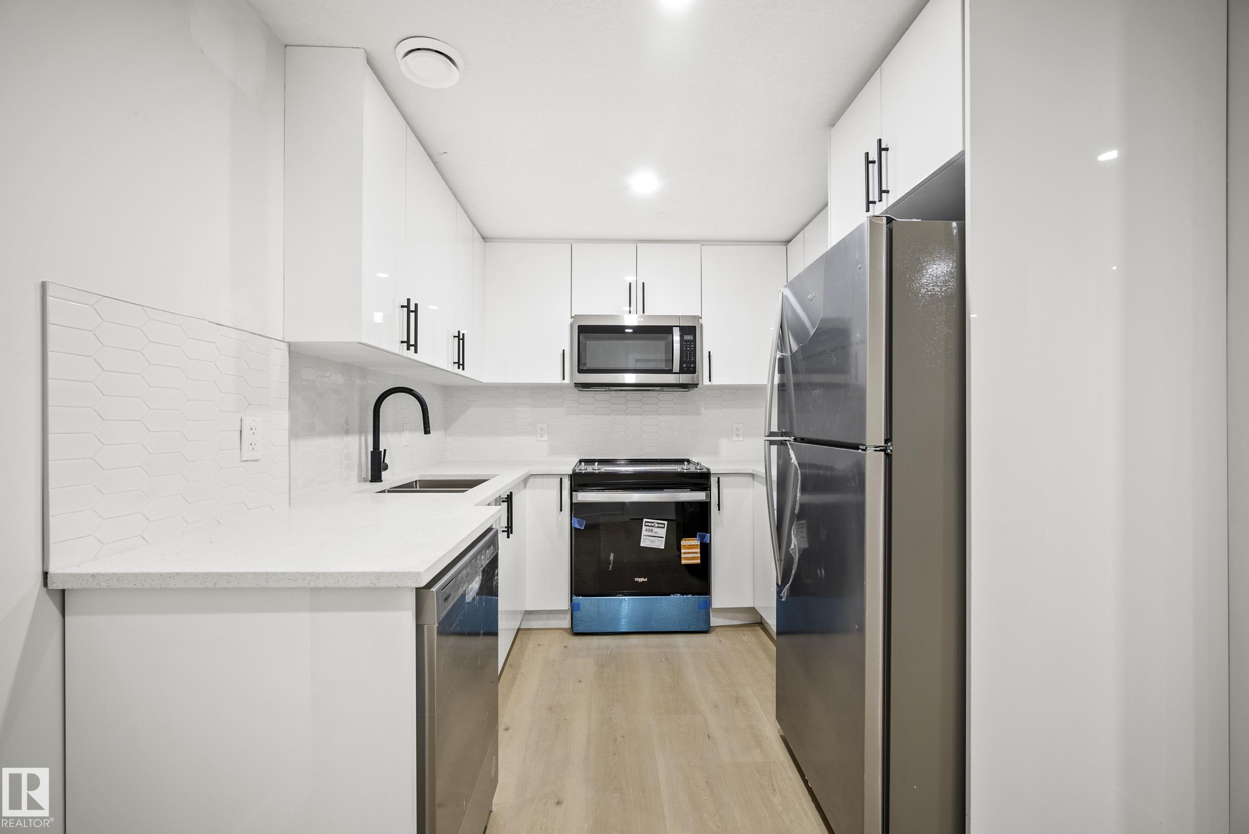 Photo 47 at 15031 10 Street NW, Fraser, Edmonton