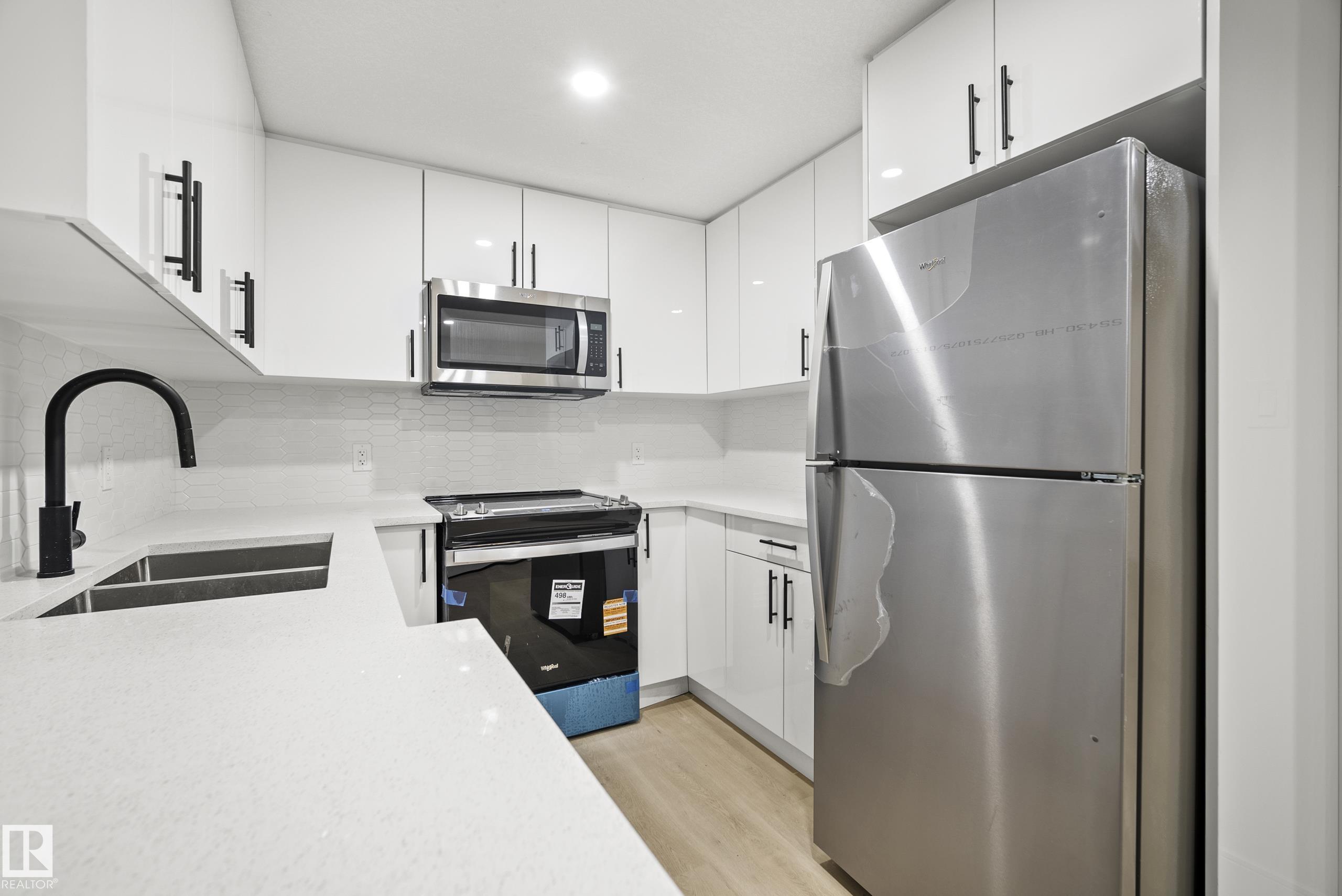 Photo 49 at 15031 10 Street NW, Fraser, Edmonton