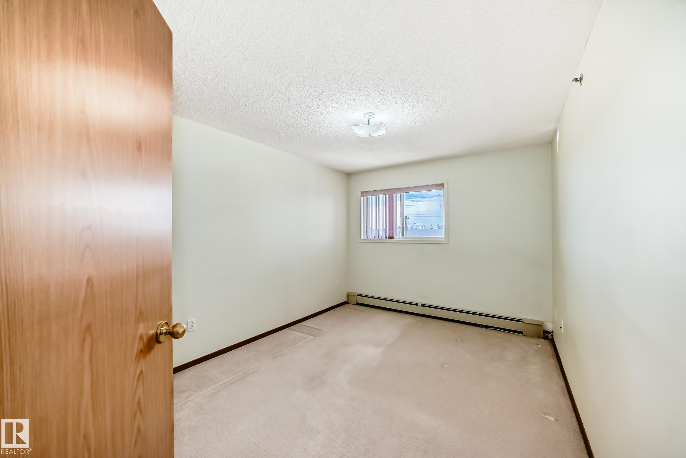 Photo 26 at 301 - 4906 47 Avenue, Central Business District, Leduc