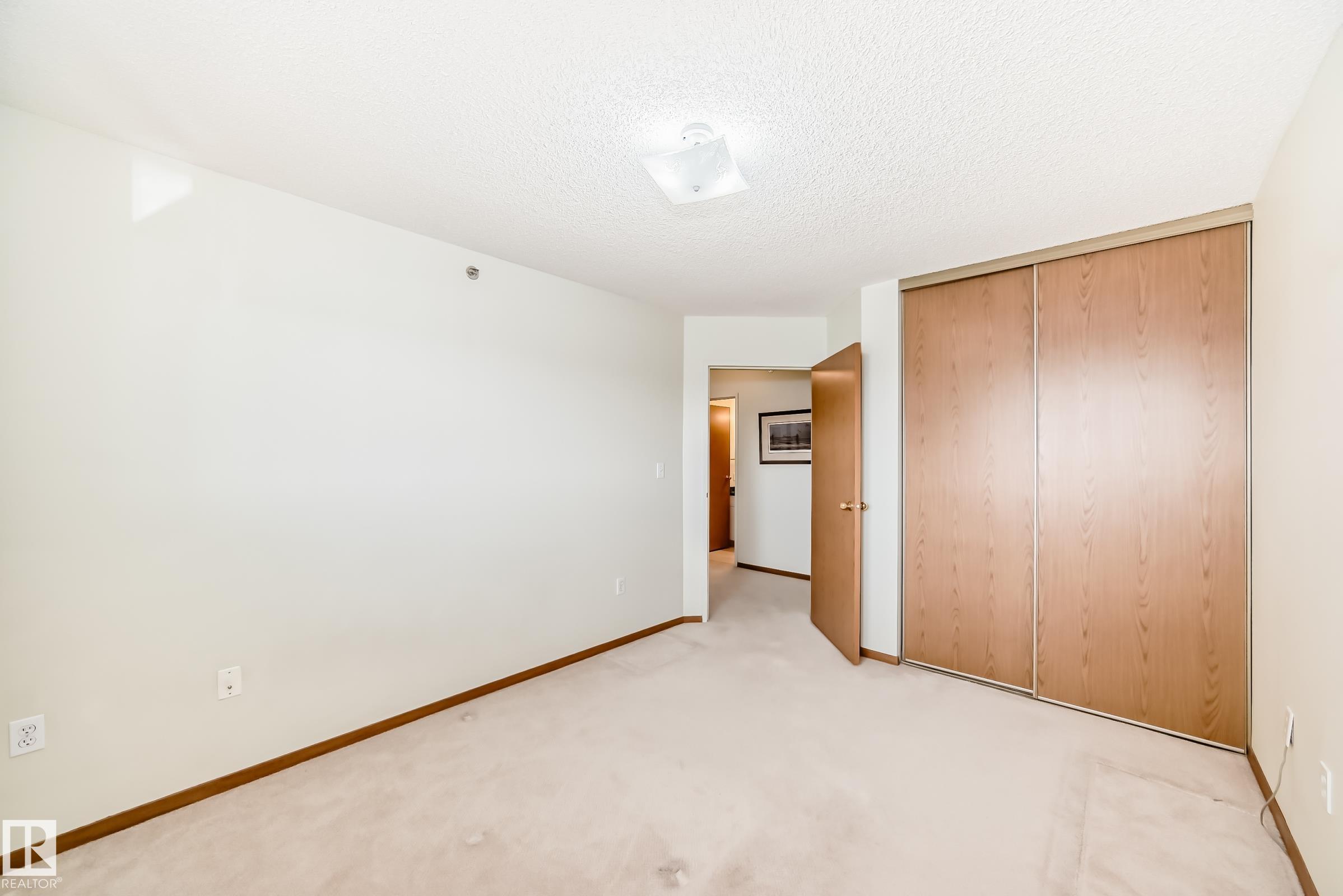 Photo 28 at 301 - 4906 47 Avenue, Central Business District, Leduc