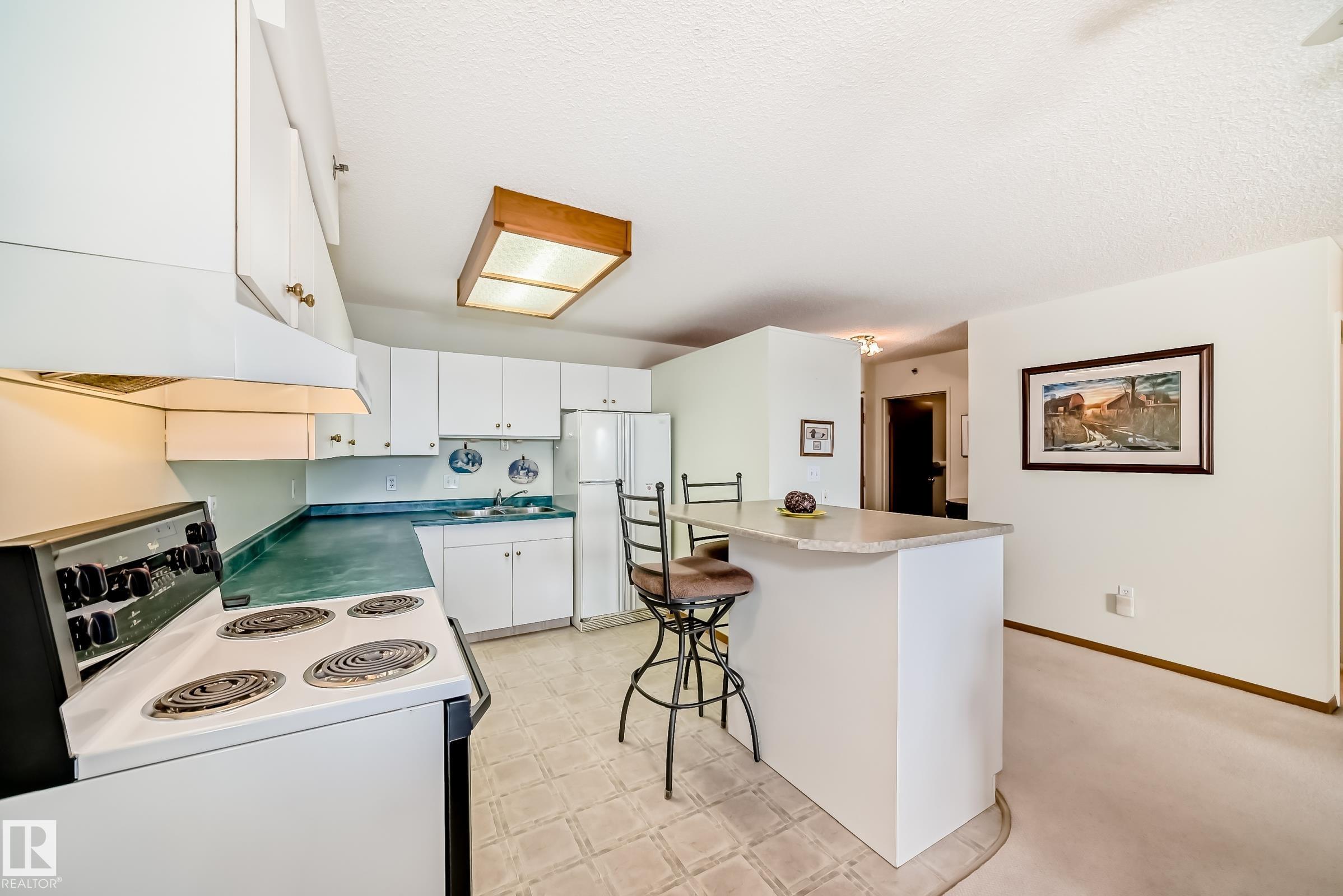 Photo 9 at 301 - 4906 47 Avenue, Central Business District, Leduc