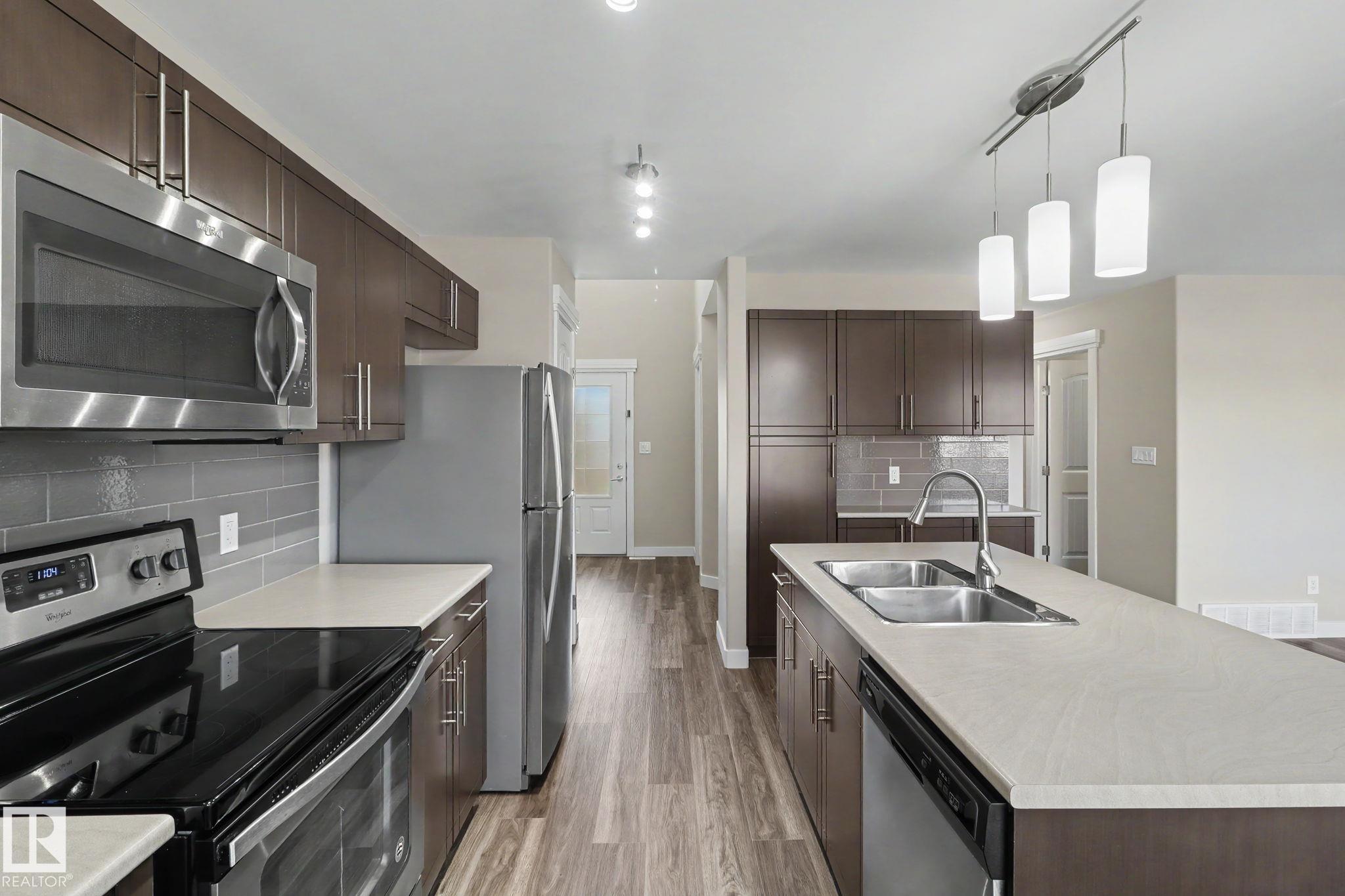 Photo 11 at 2547 Amerongen Crescent SW, Allard, Edmonton