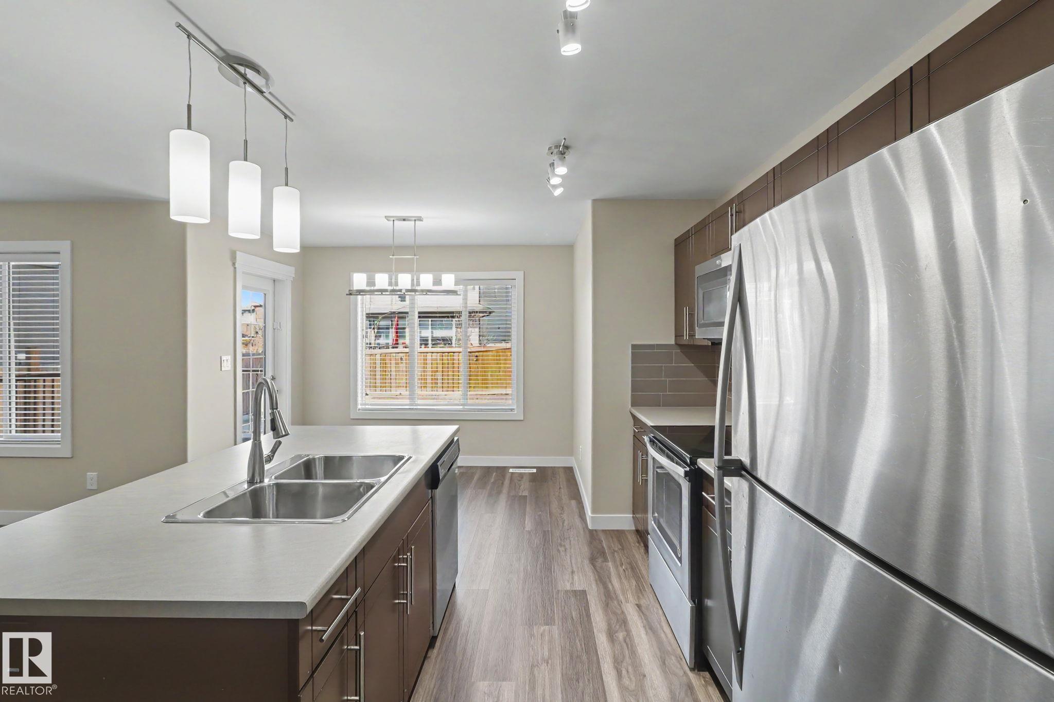 Photo 10 at 2547 Amerongen Crescent SW, Allard, Edmonton