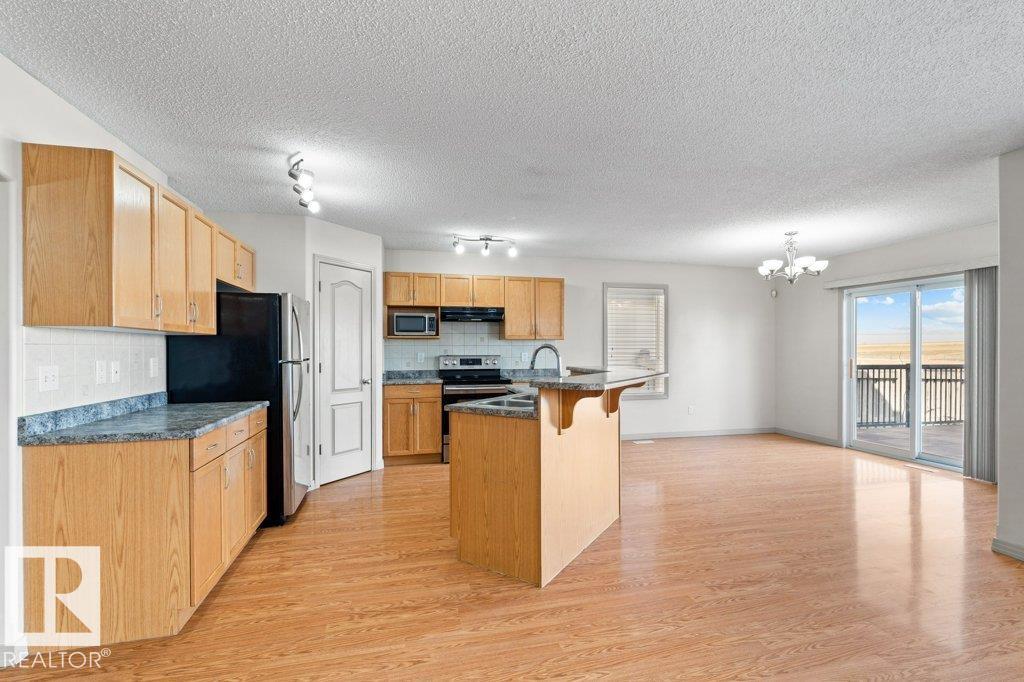 Photo 9 at 716 Mcallister Loop SW, Macewan, Edmonton