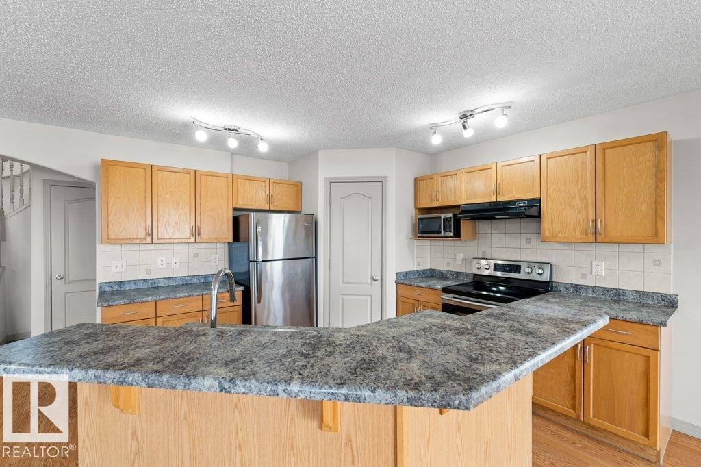 Photo 10 at 716 Mcallister Loop SW, Macewan, Edmonton