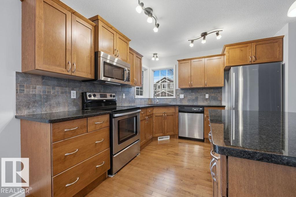 Photo 11 at 24 Sweetberry Cove, Suntree, Leduc