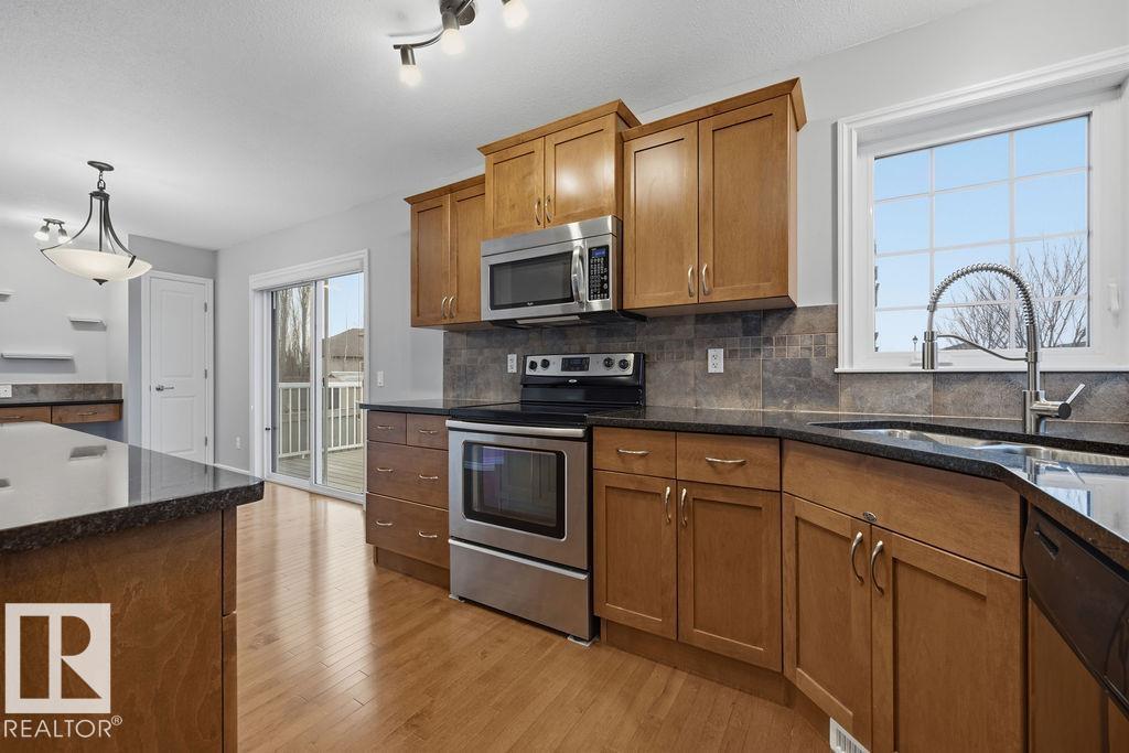 Photo 10 at 24 Sweetberry Cove, Suntree, Leduc