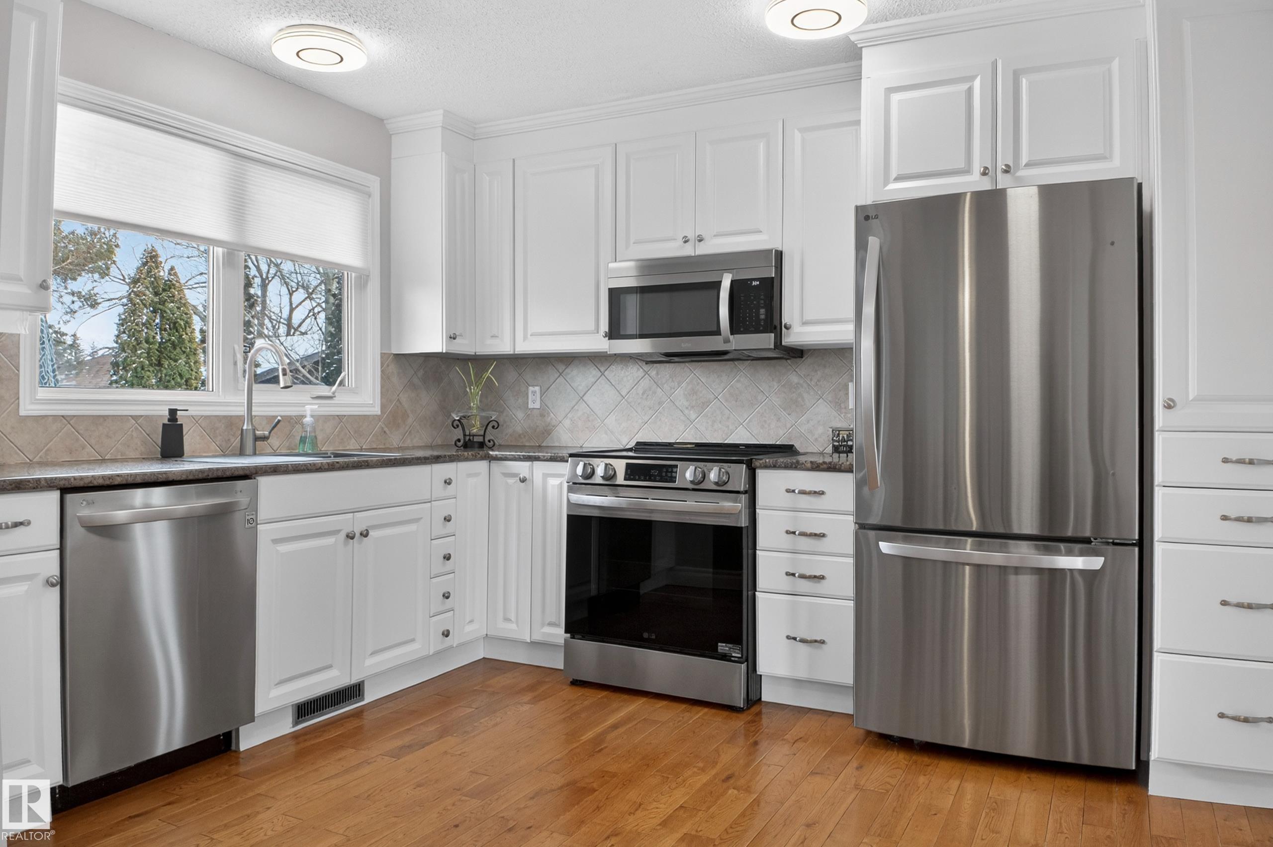 Photo 14 at 104 Grandin Drive, Hittinger, Morinville