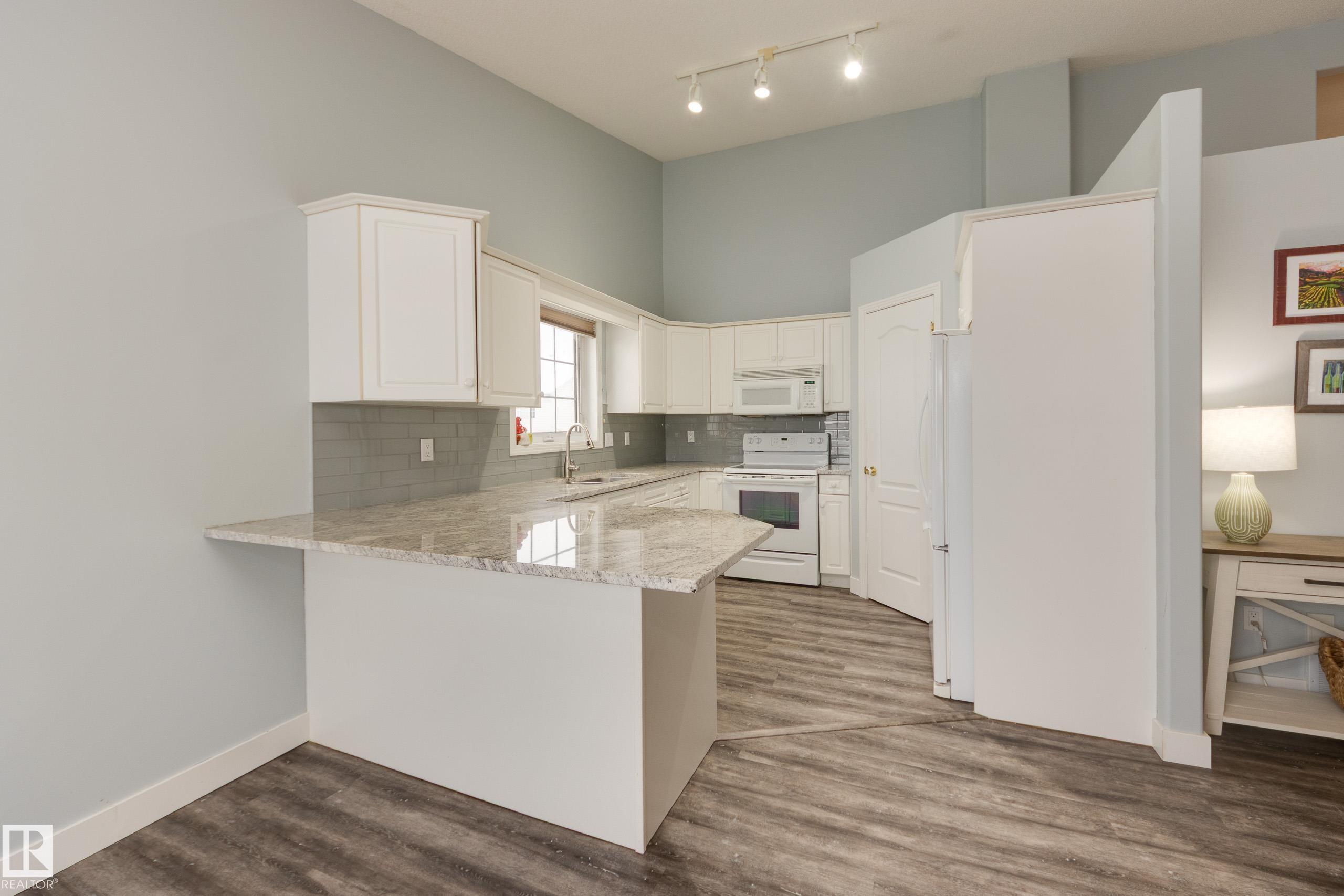 Photo 12 at 24 - 40 Cranford Way, Durham Town Square, Sherwood Park