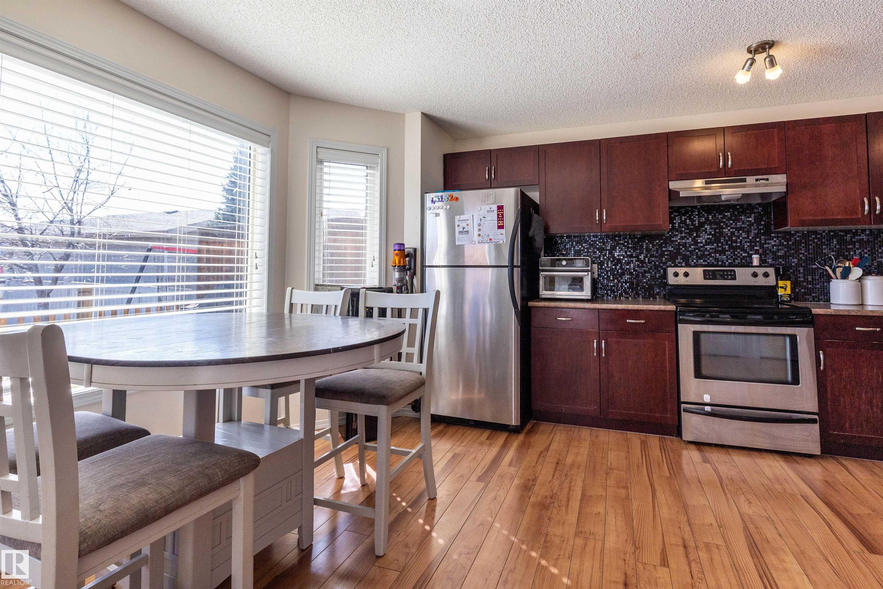 Photo 9 at 21313 60 Avenue NW, The Hamptons, Edmonton