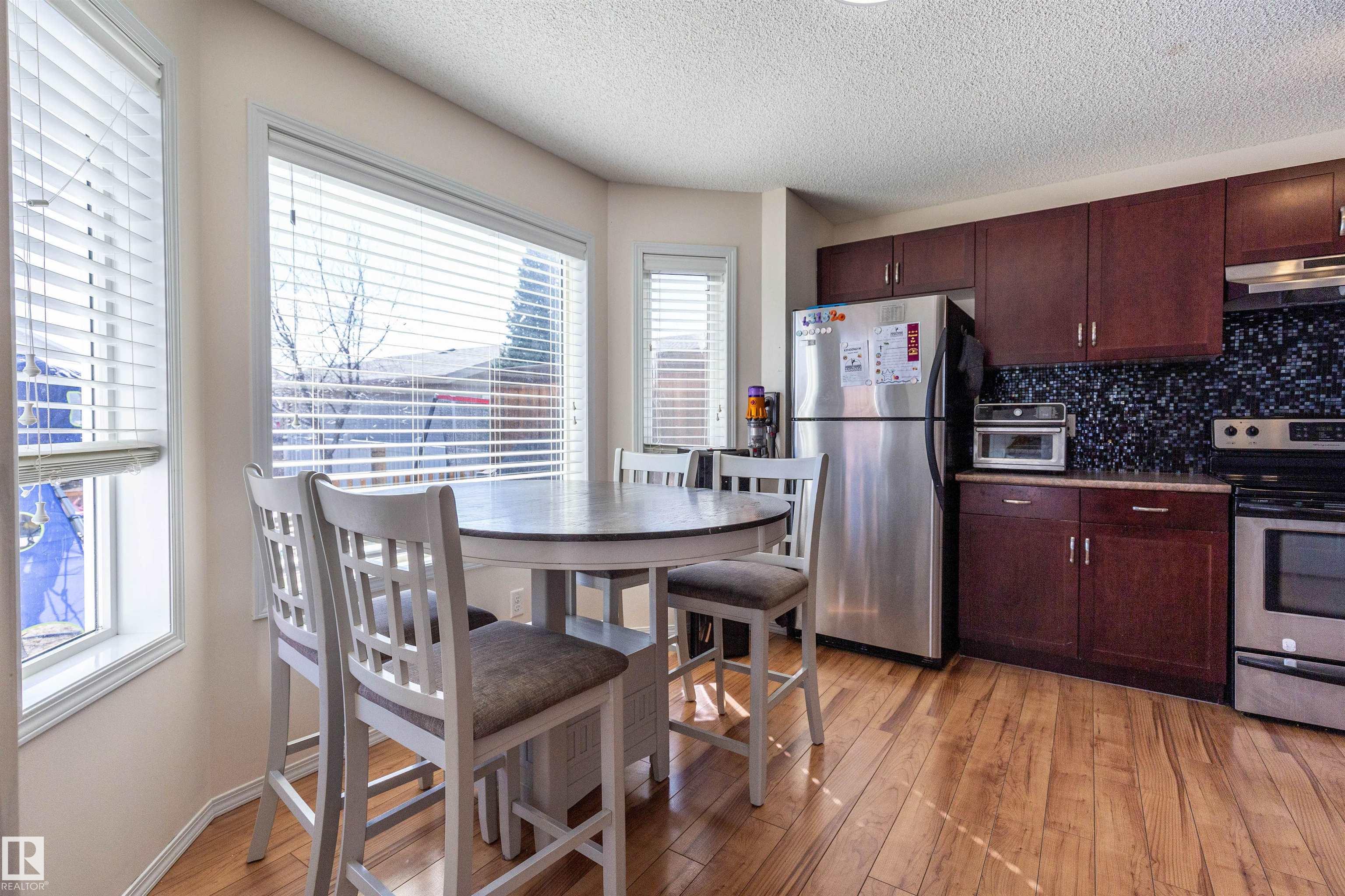 Photo 10 at 21313 60 Avenue NW, The Hamptons, Edmonton