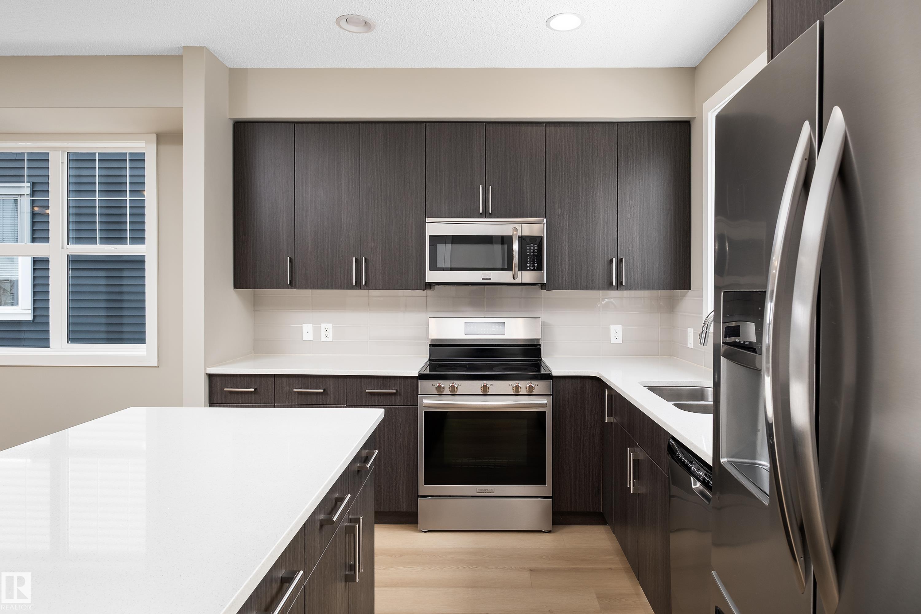 Photo 11 at 39 - 2803 James Mowatt Trail SW, Callaghan, Edmonton