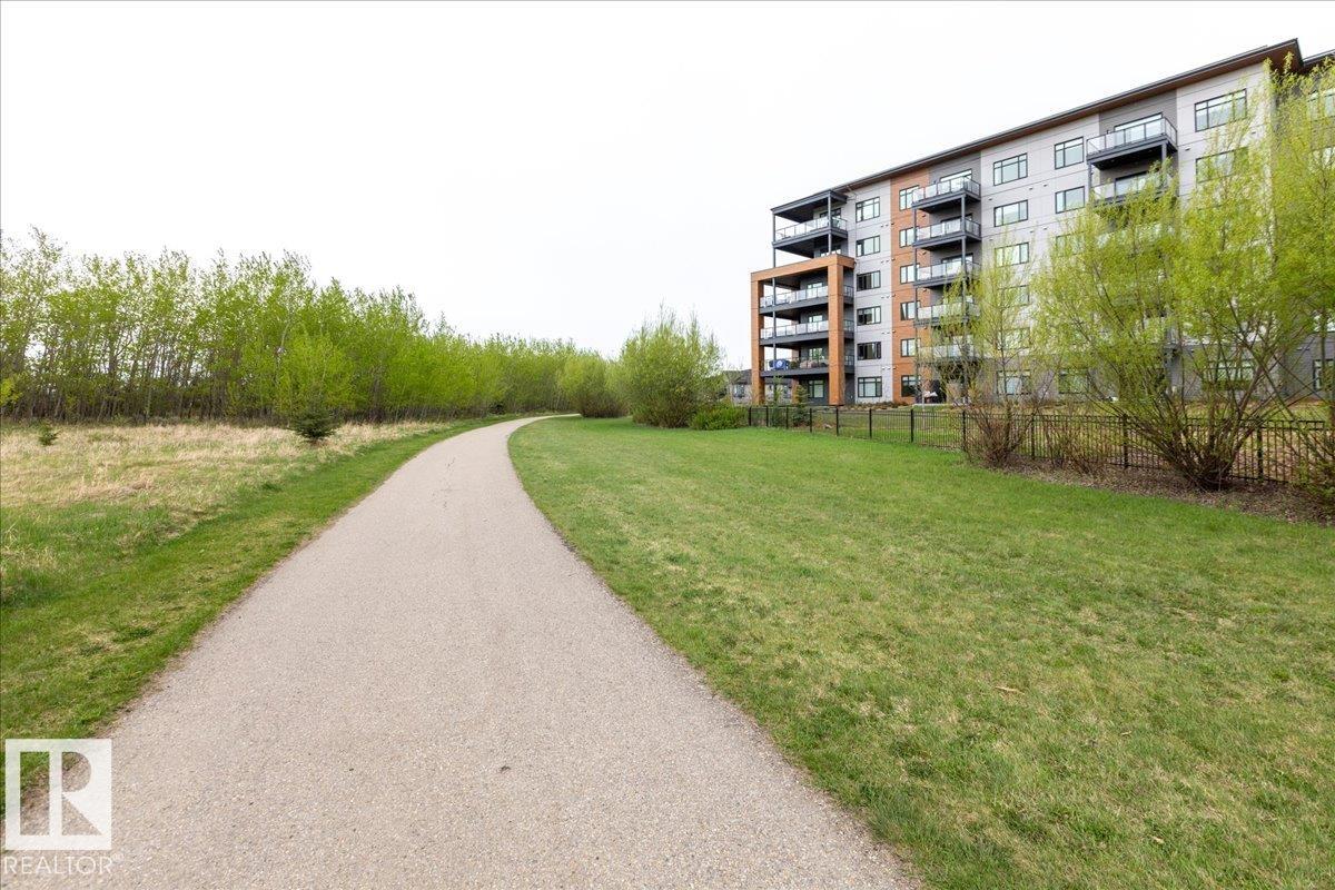 Photo 59 at 404 - 7463 May Common NW, Magrath Heights, Edmonton