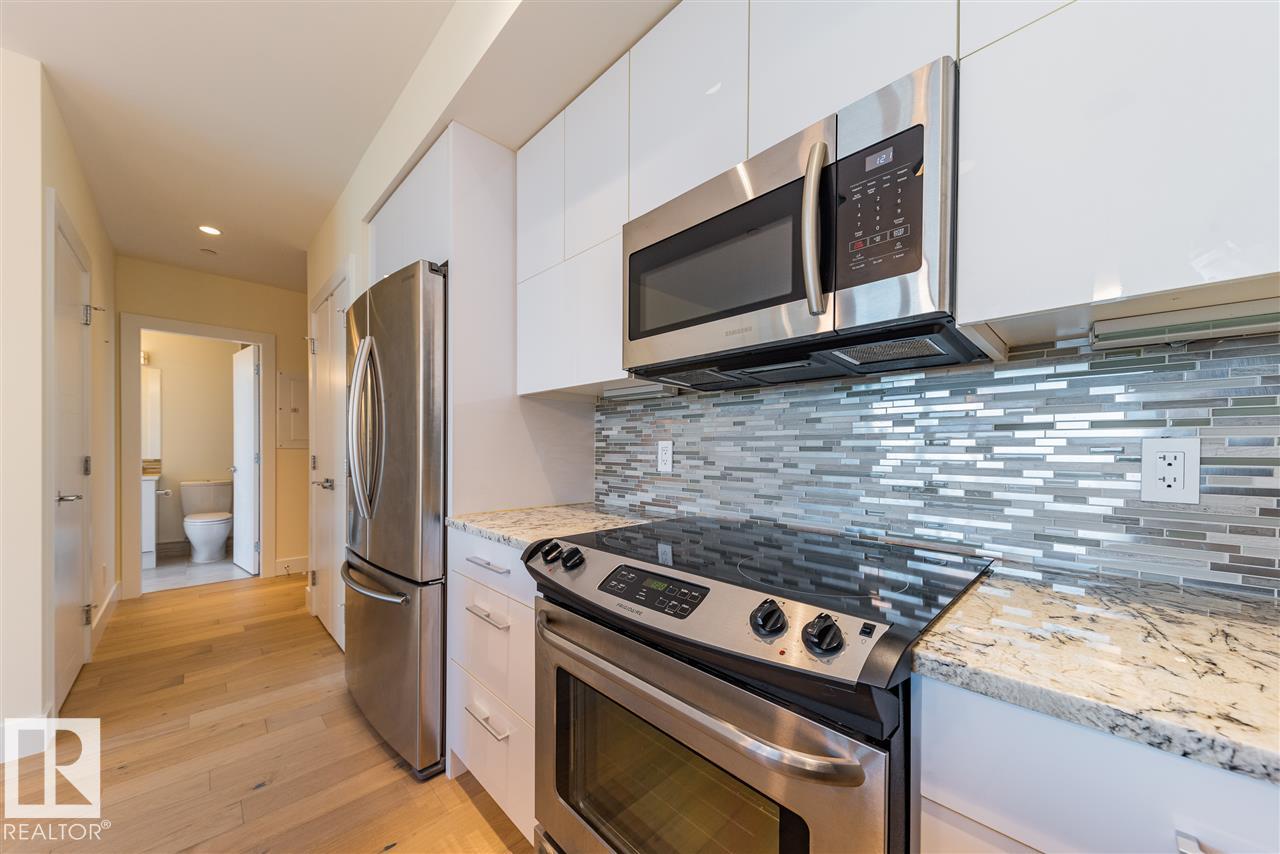 Photo 11 at 401 - 11969 Jasper Avenue NW, Wîhkwêntôwin, Edmonton