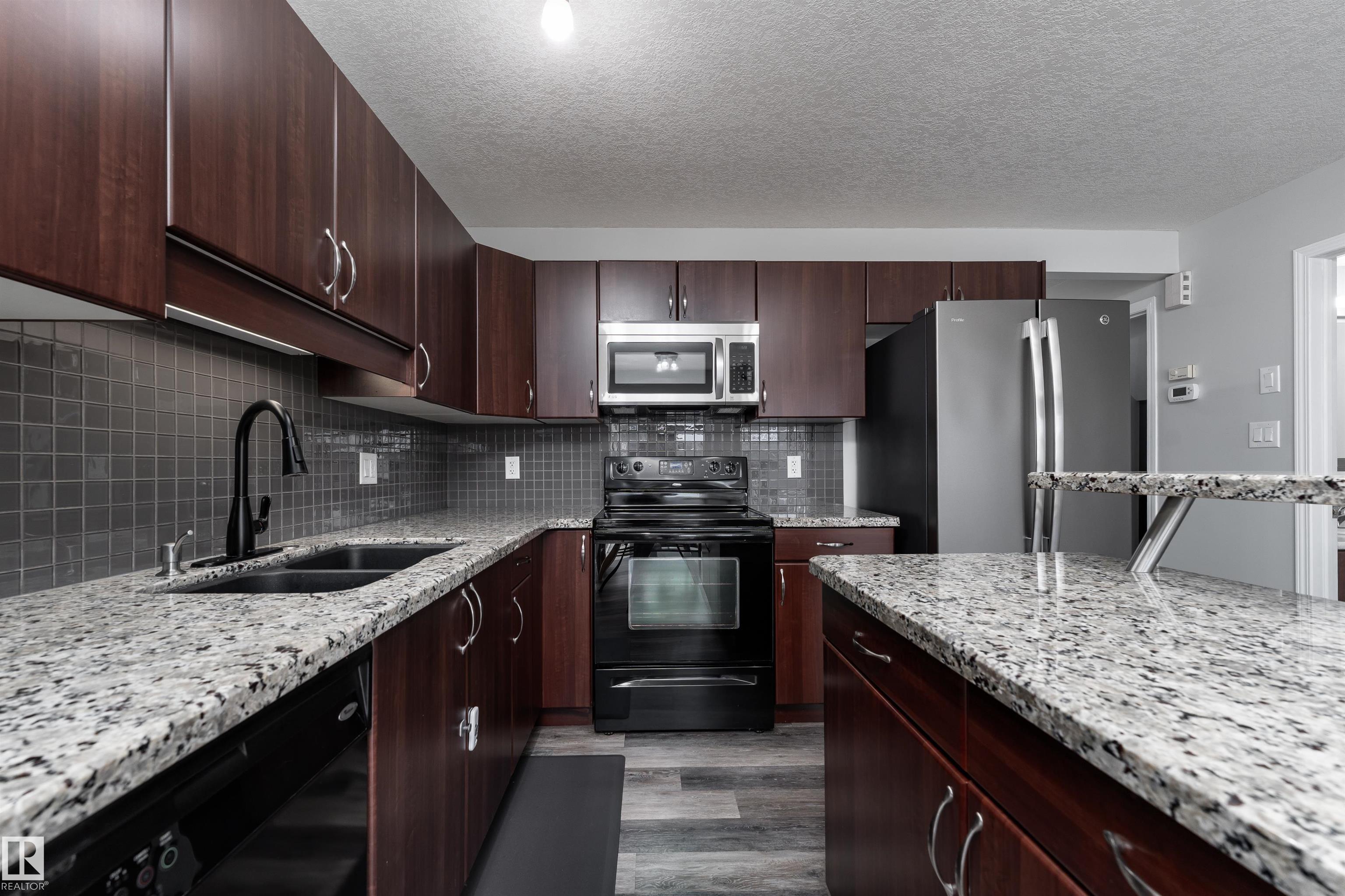 Photo 13 at 5911 8 Avenue SW, Charlesworth, Edmonton