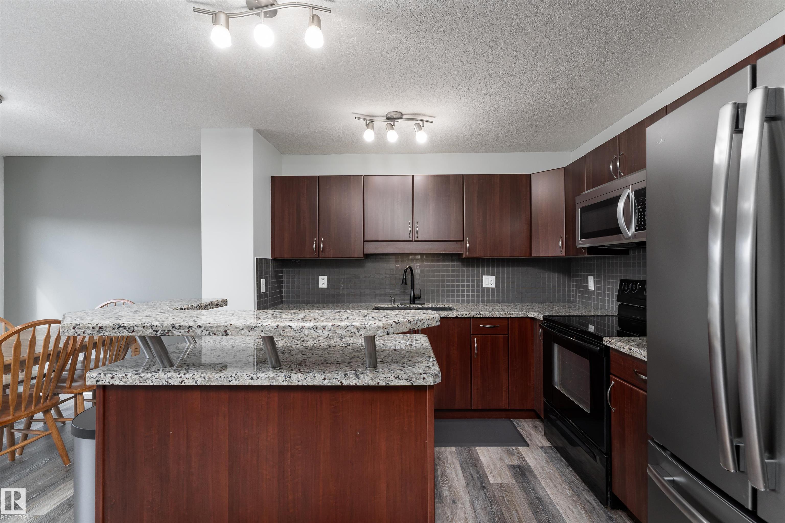 Photo 6 at 5911 8 Avenue SW, Charlesworth, Edmonton