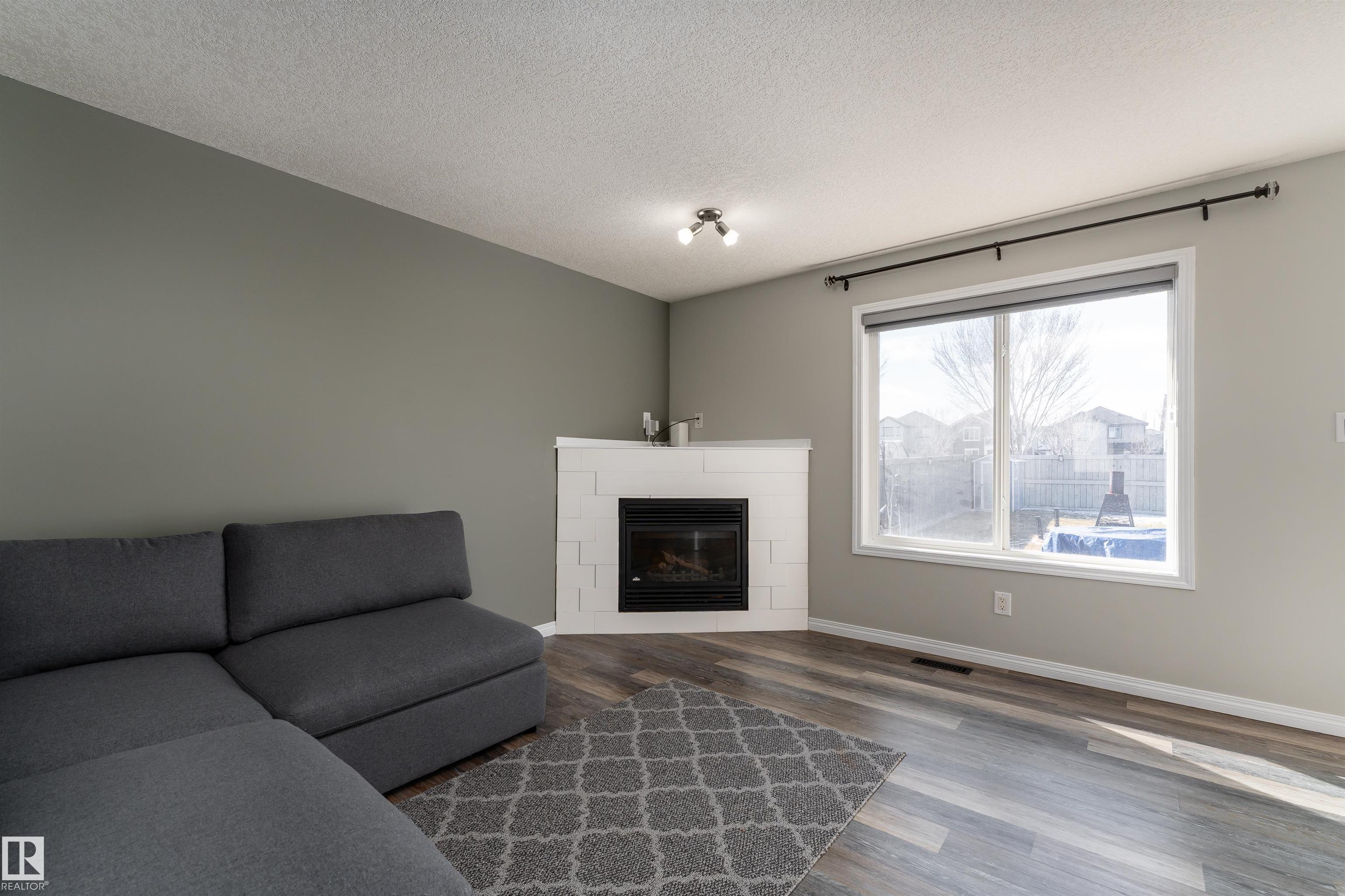 Photo 10 at 5911 8 Avenue SW, Charlesworth, Edmonton