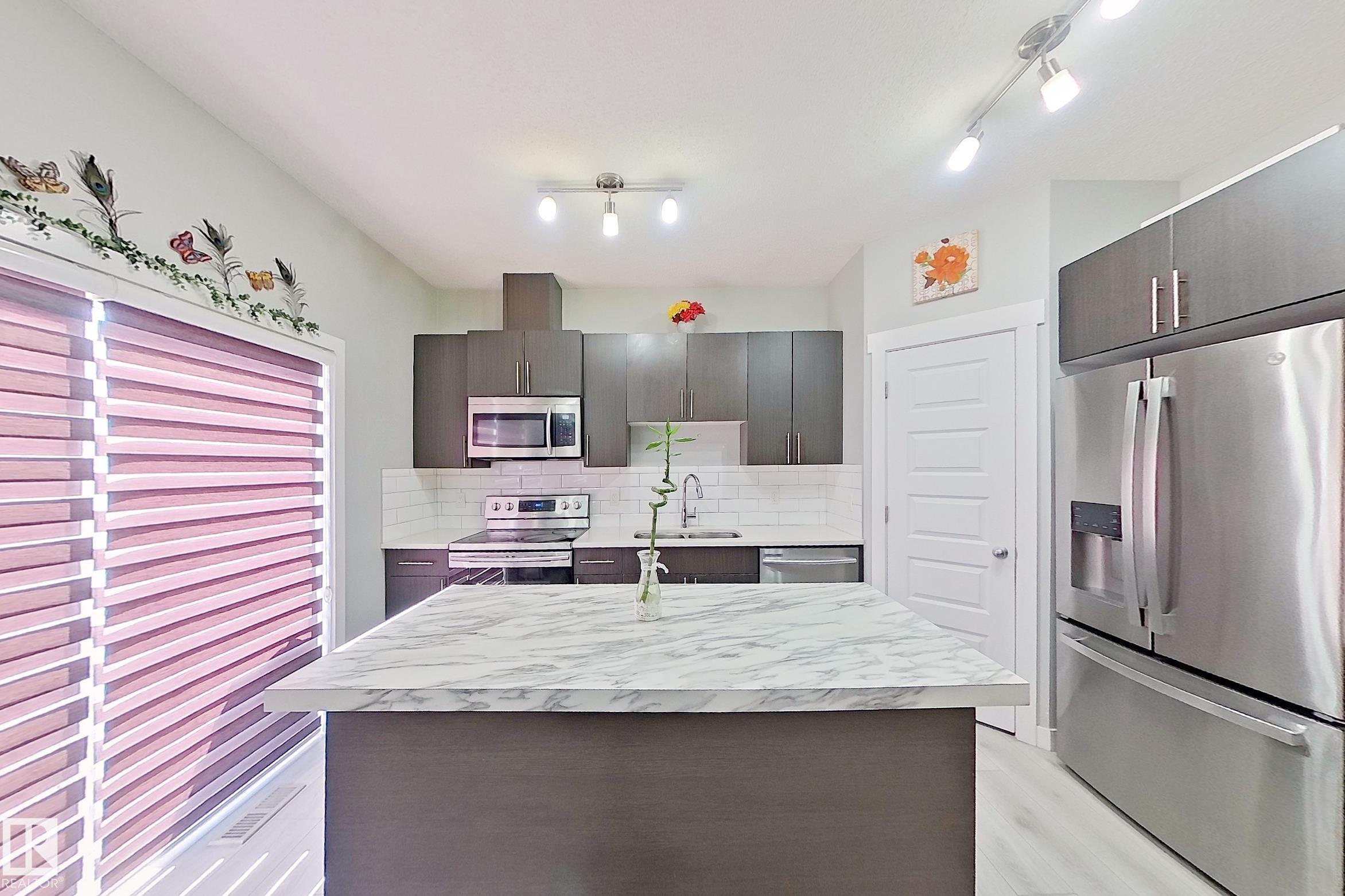 Photo 8 at 1221 27 Street NW, Laurel, Edmonton