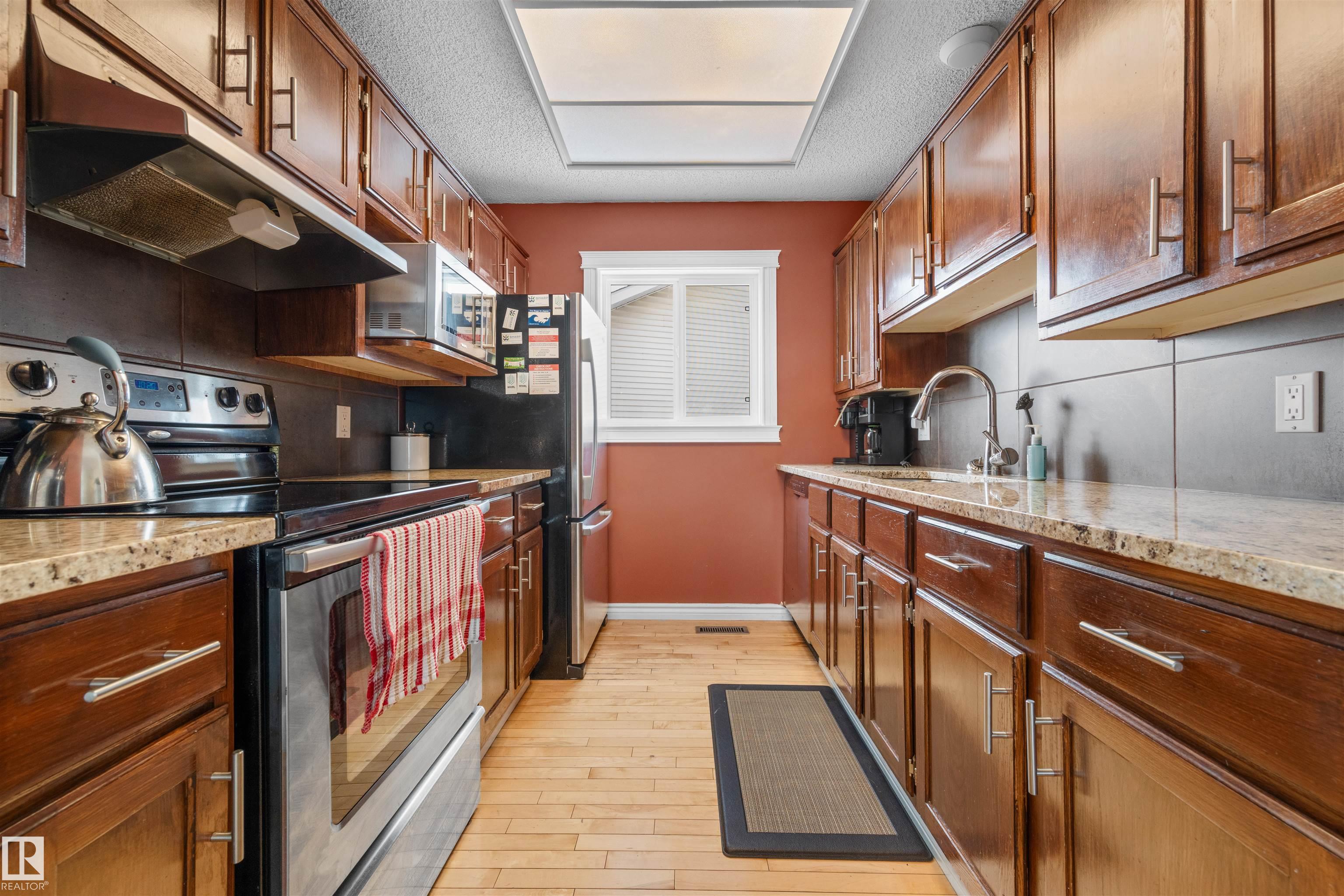 Photo 13 at 1127 36 Street NW, Crawford Plains, Edmonton