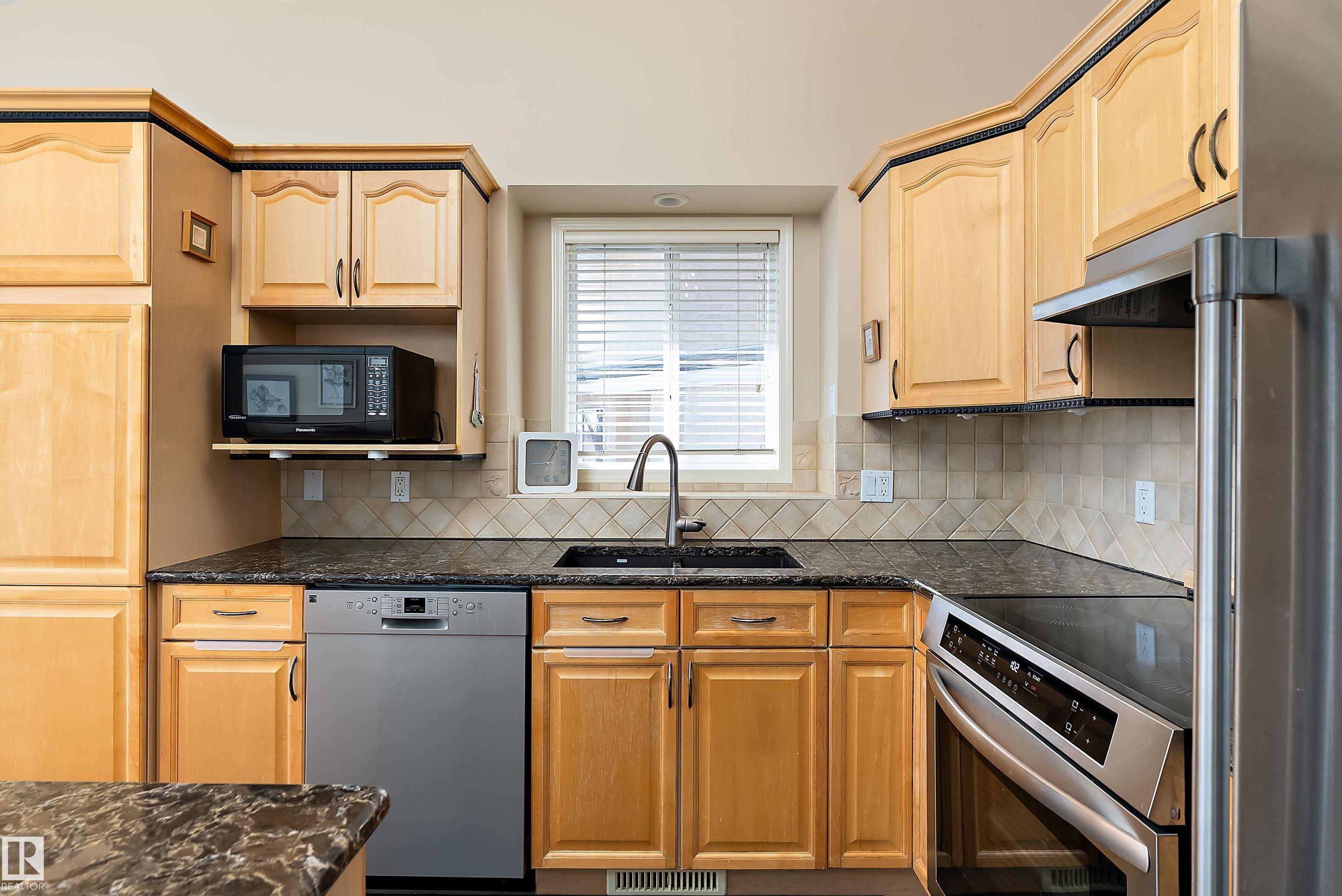 Photo 16 at 14 - 920 119 Street NW, Twin Brooks, Edmonton