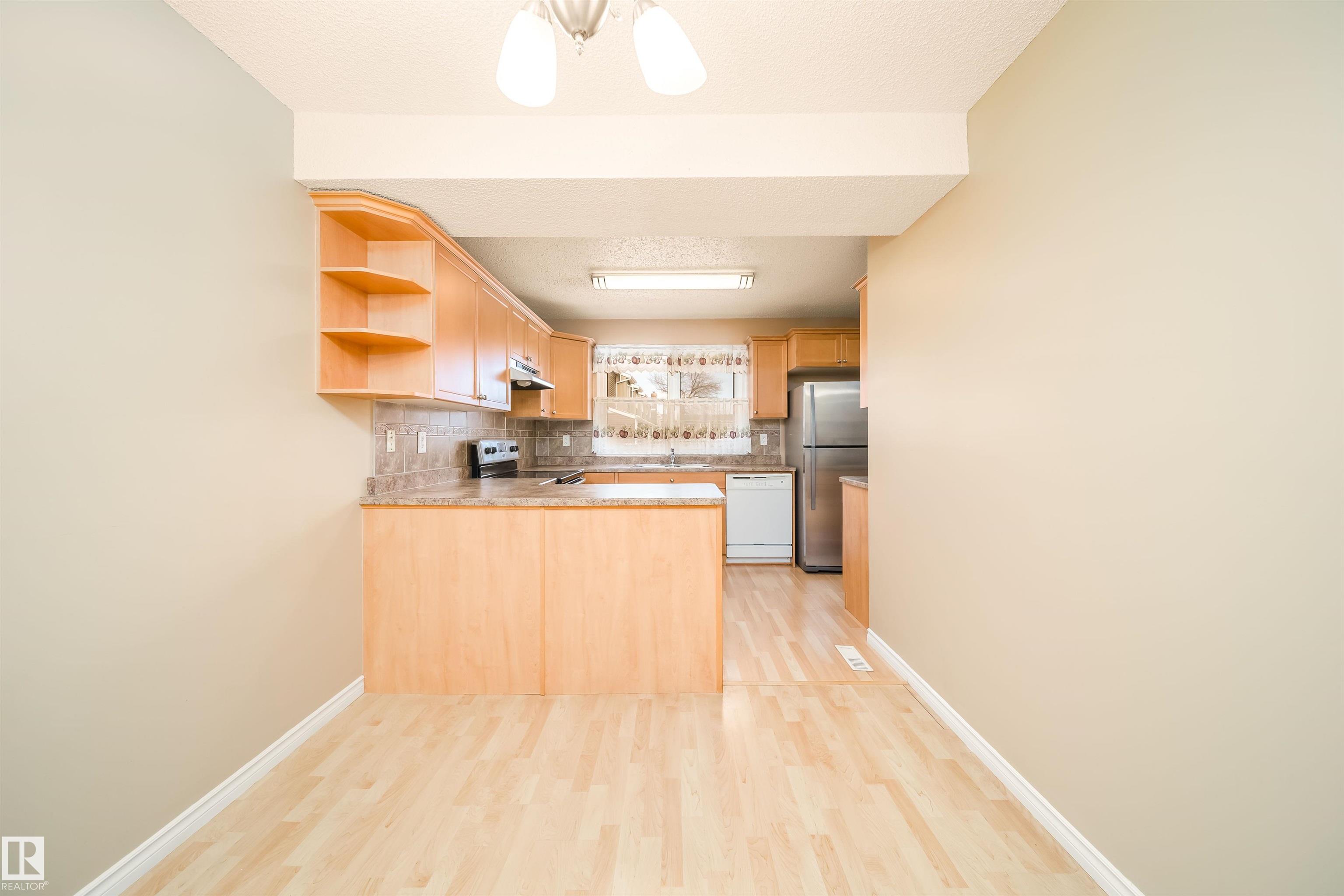 Photo 12 at 18 - 3115 119 Street NW, Sweet Grass, Edmonton