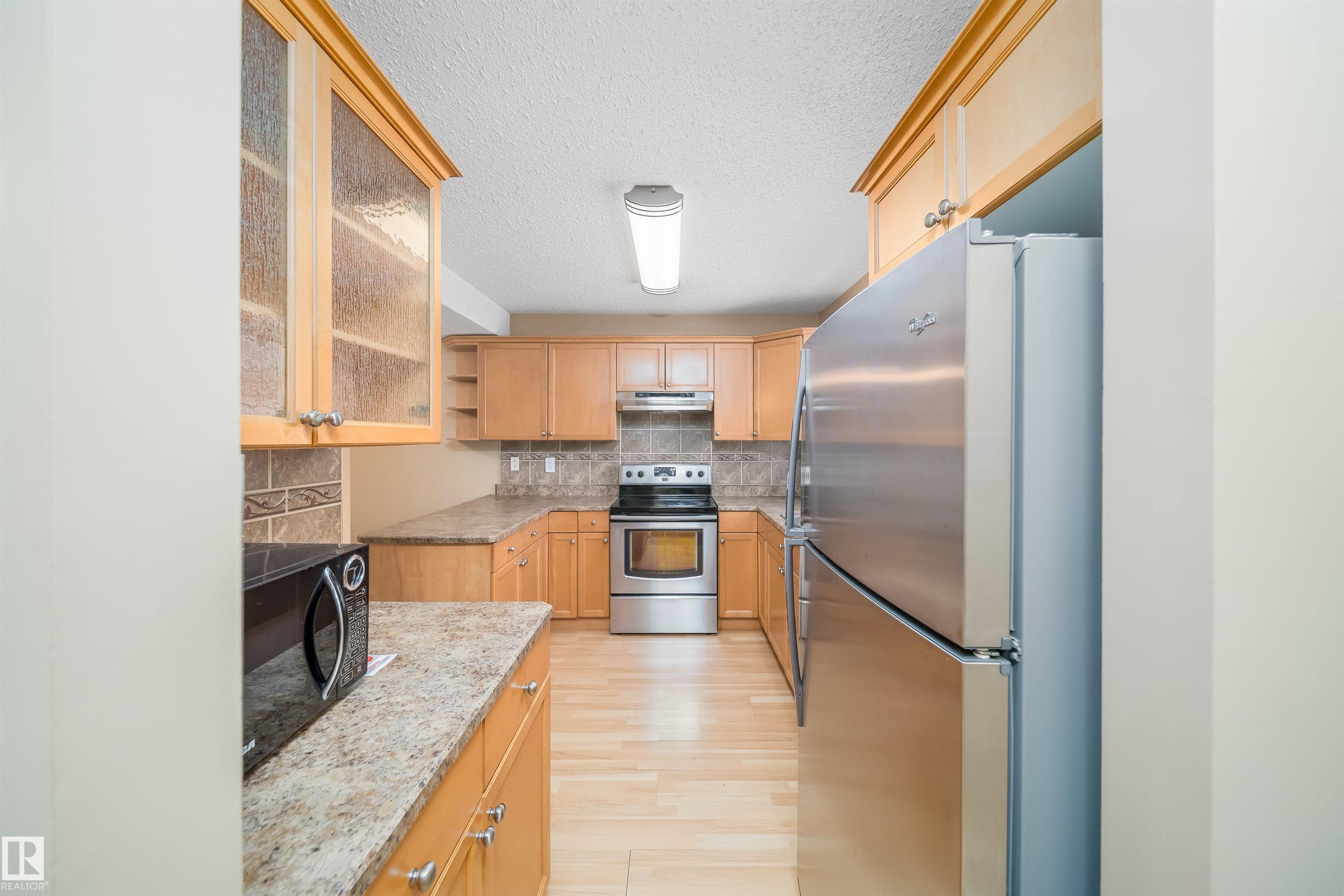 Photo 6 at 18 - 3115 119 Street NW, Sweet Grass, Edmonton