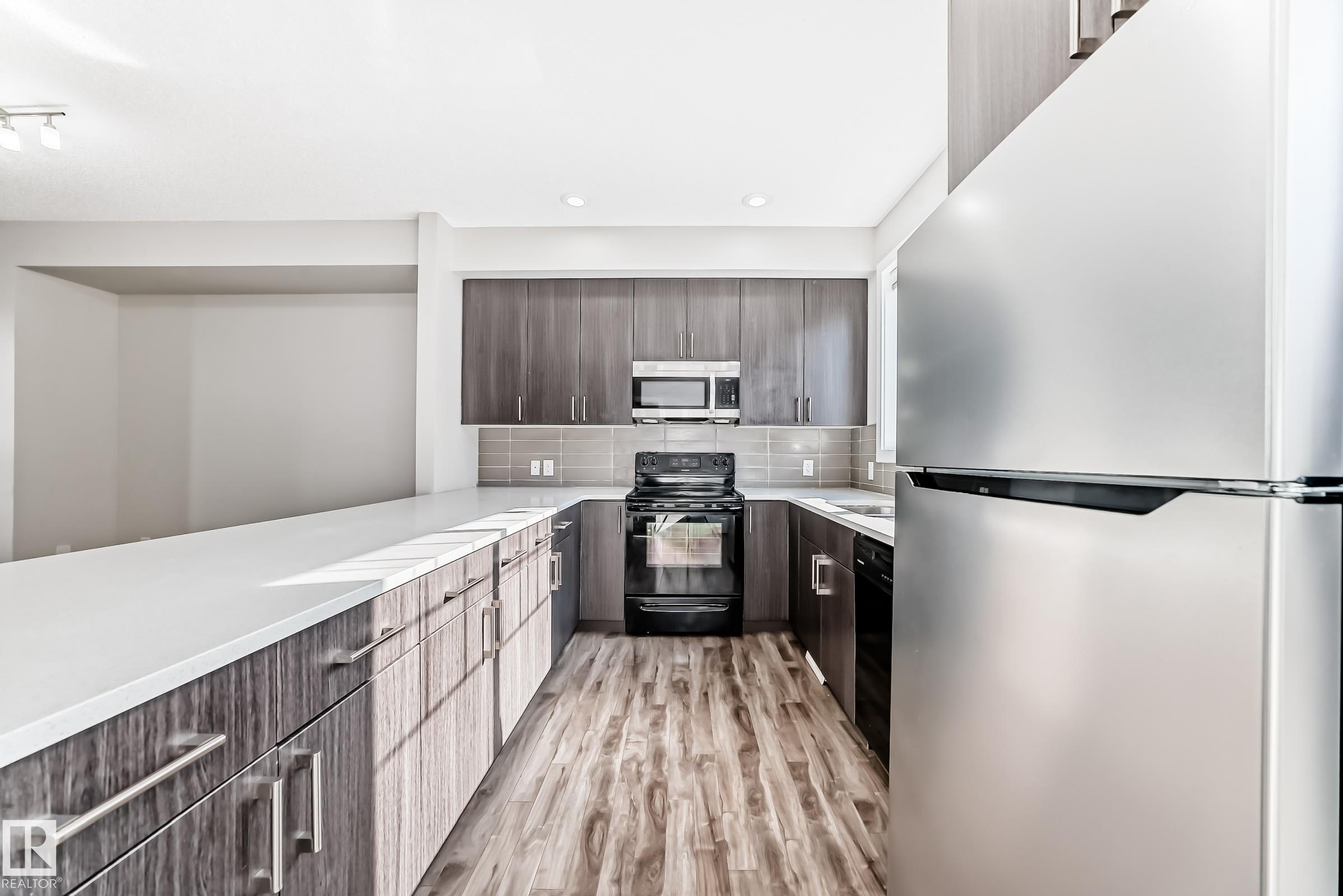 Photo 10 at 75 - 2803 James Mowatt Trail SW, Callaghan, Edmonton