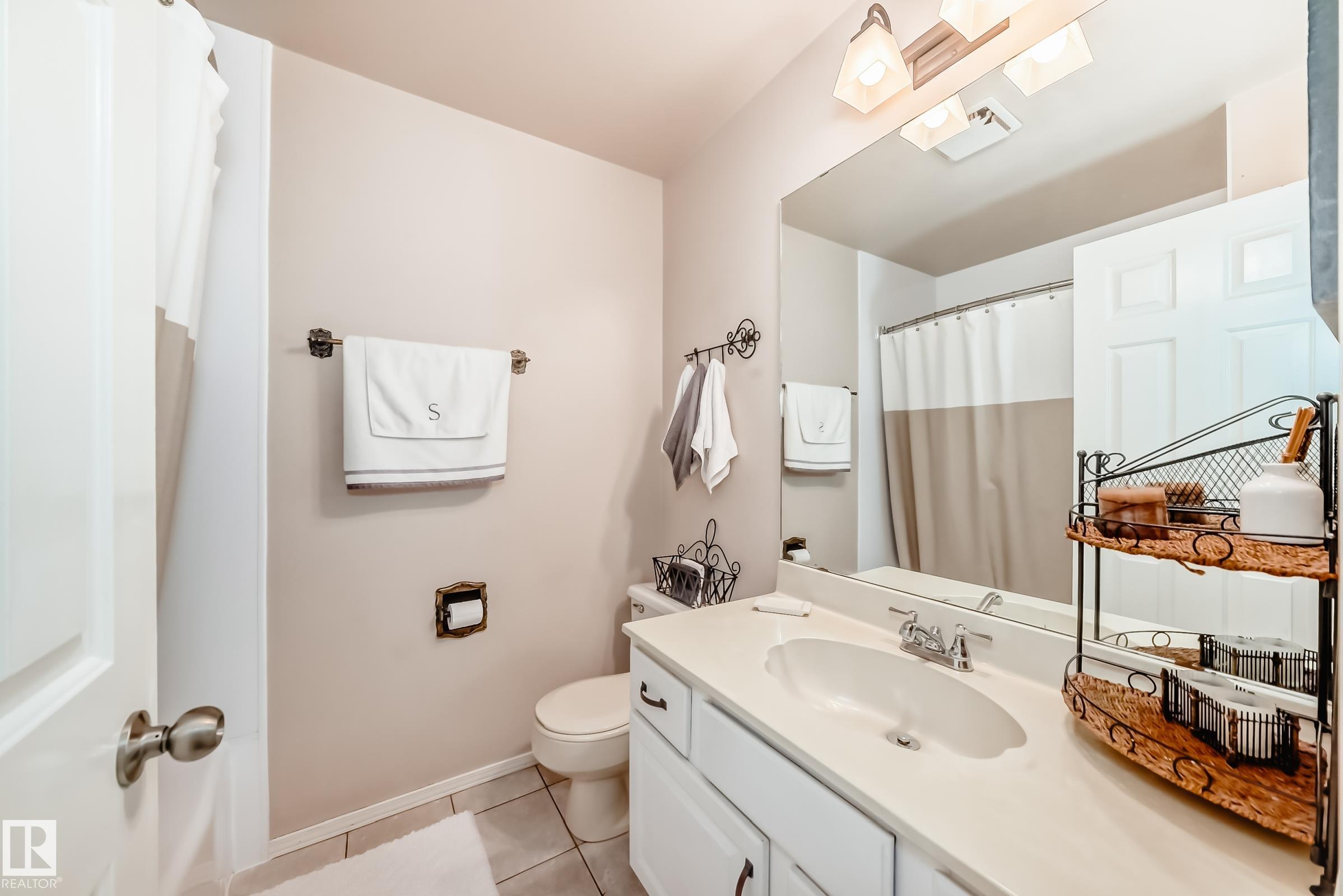 Photo 13 at 660 Village Drive, Village on the Lake, Sherwood Park