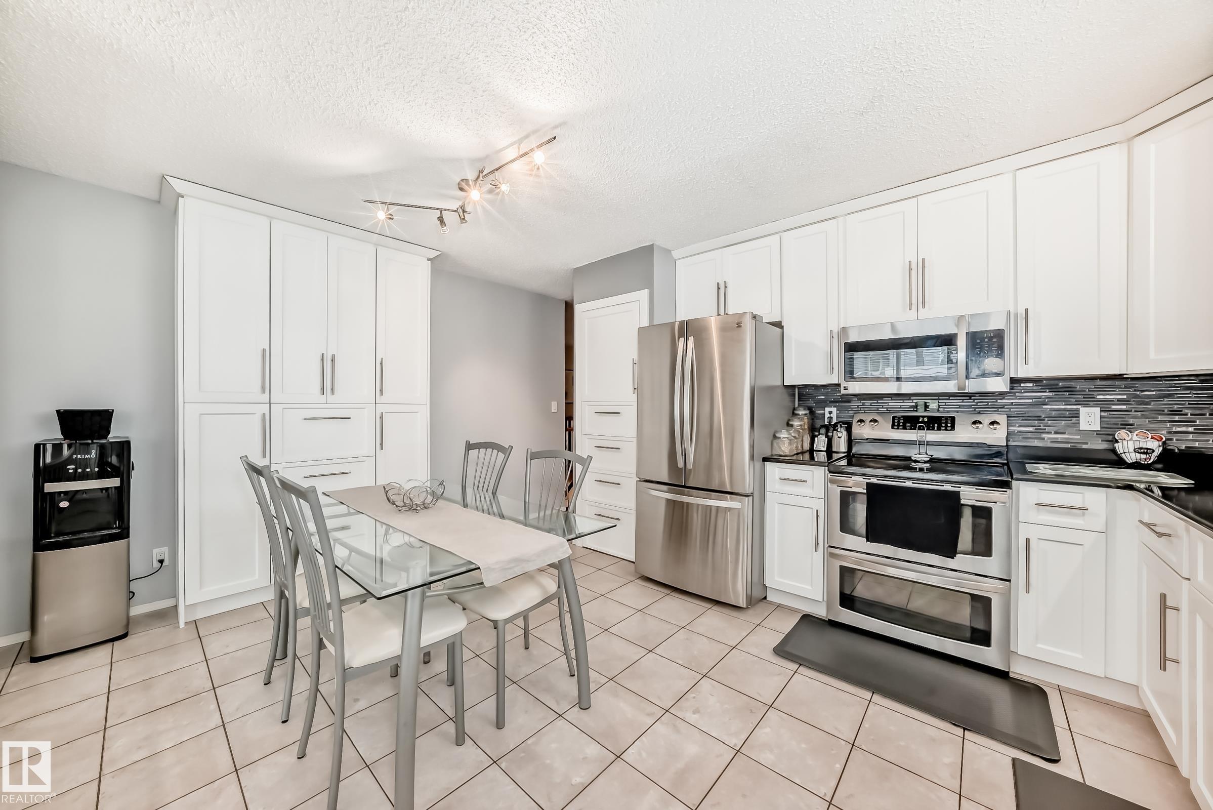 Photo 6 at 660 Village Drive, Village on the Lake, Sherwood Park