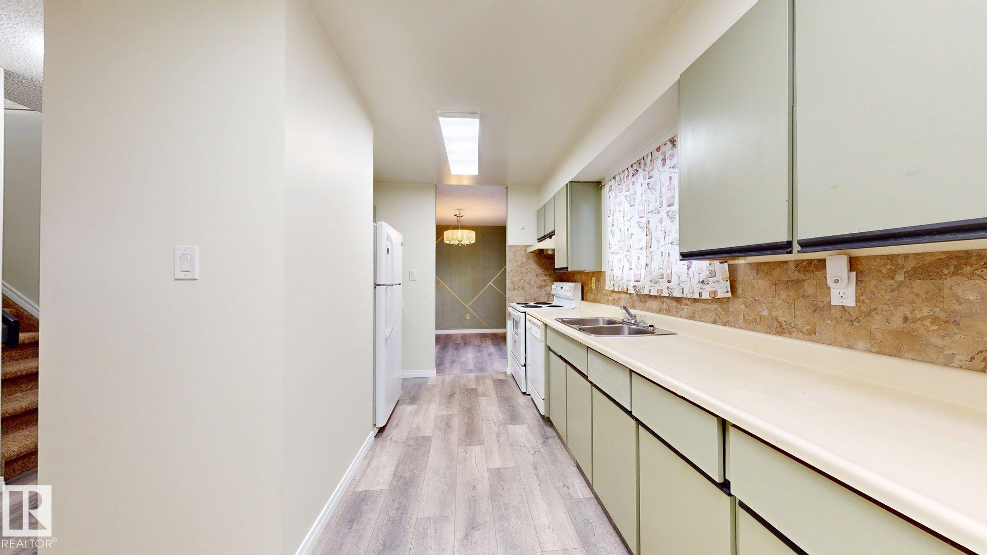 Photo 7 at 45 - 4403 Riverbend Road NW, Ramsay Heights, Edmonton