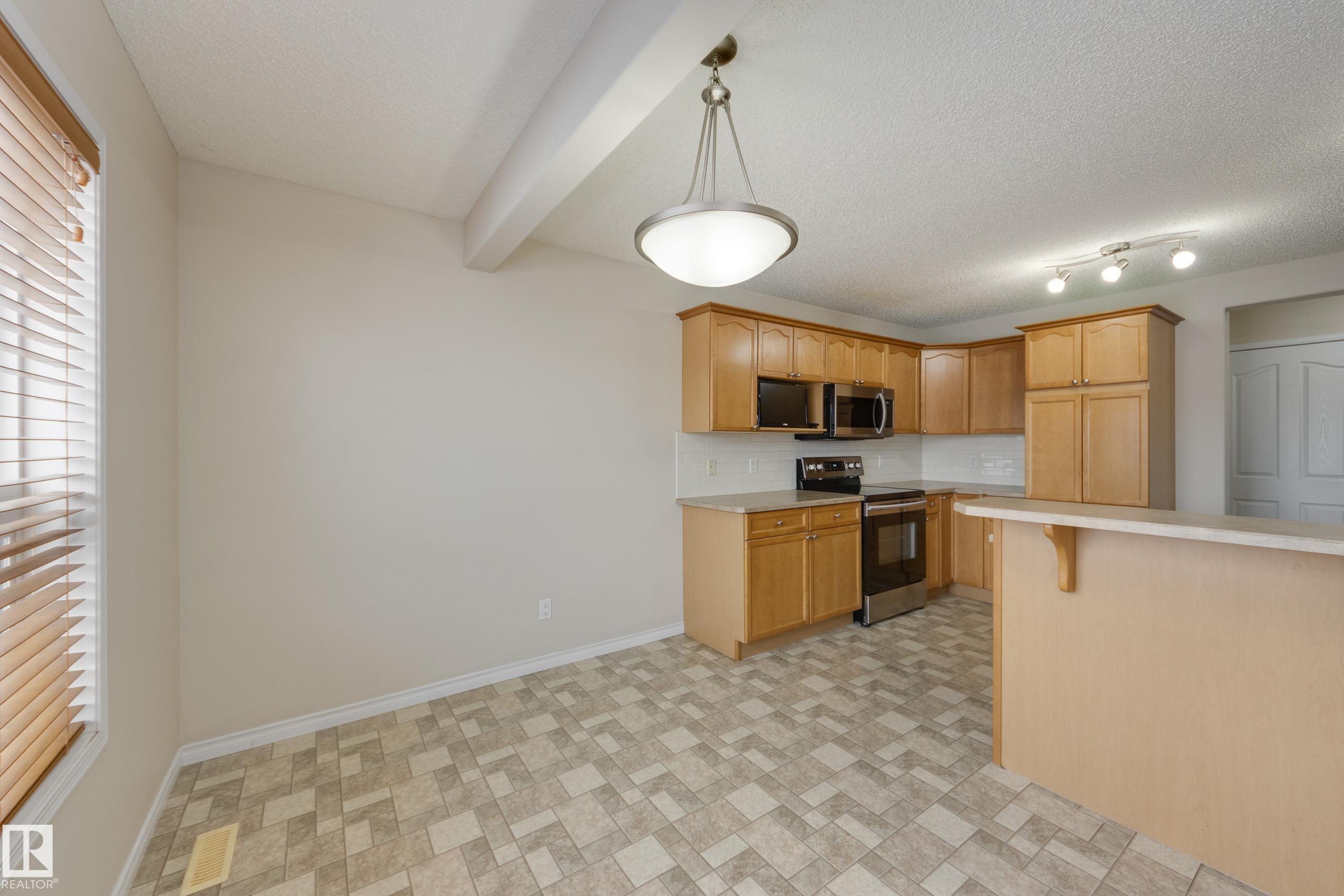 Photo 9 at 16522 56 Street NW, Hollick-Kenyon, Edmonton