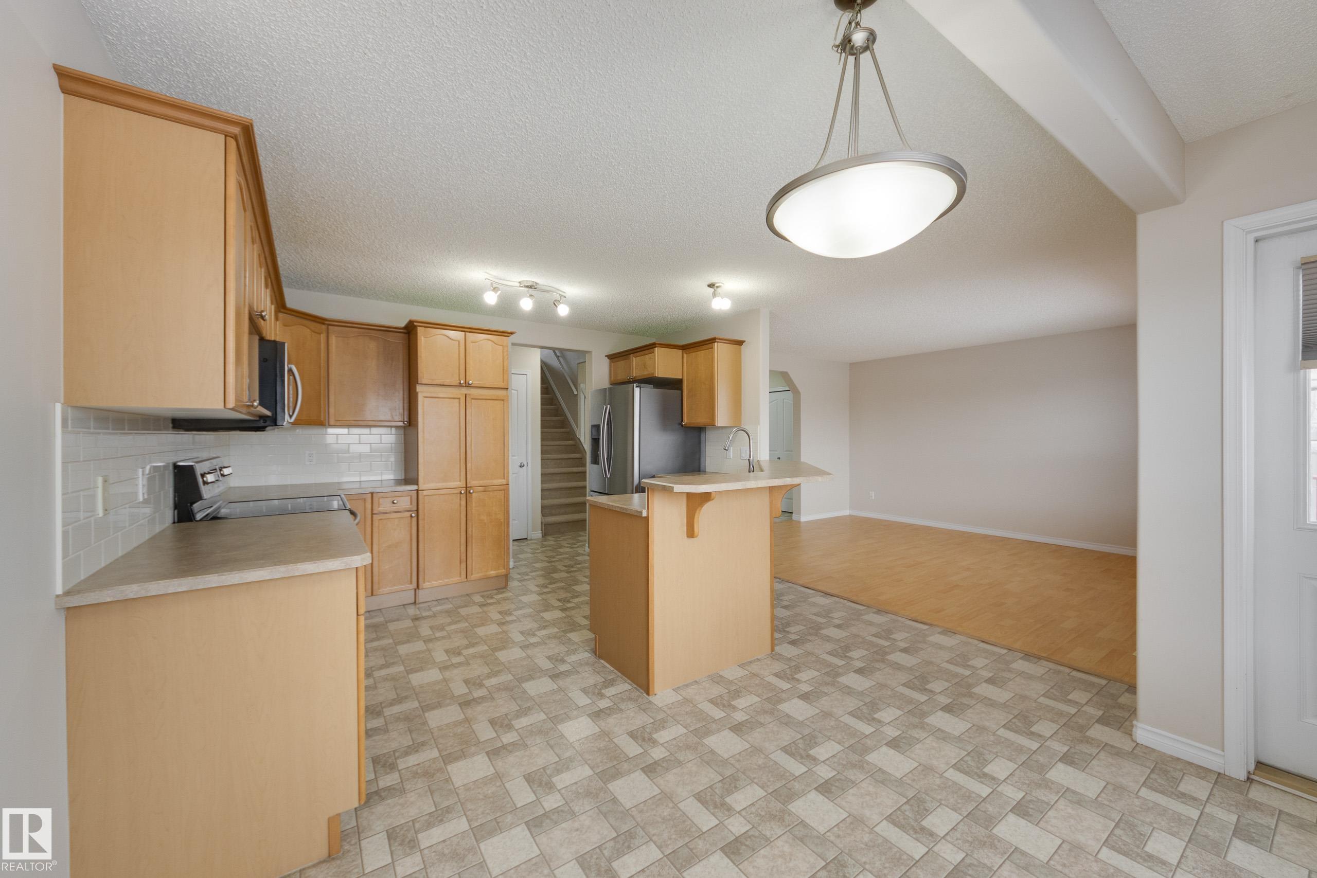 Photo 10 at 16522 56 Street NW, Hollick-Kenyon, Edmonton