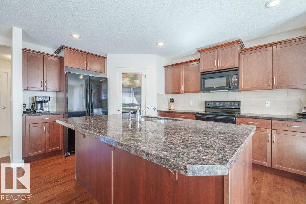 Photo 11 at 6131 12 Avenue SW, Walker, Edmonton