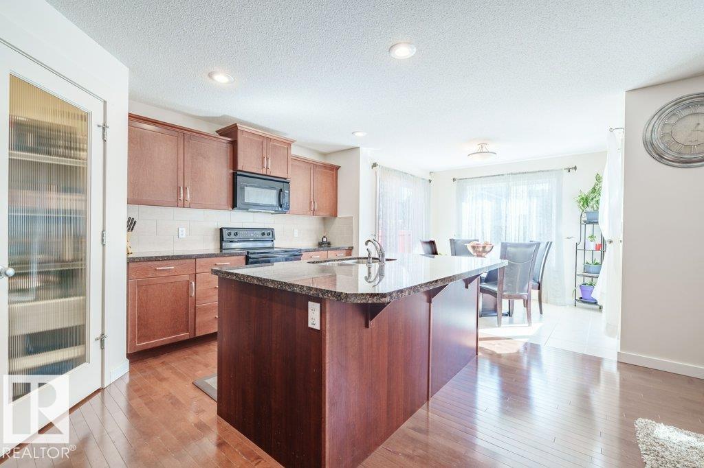 Photo 10 at 6131 12 Avenue SW, Walker, Edmonton