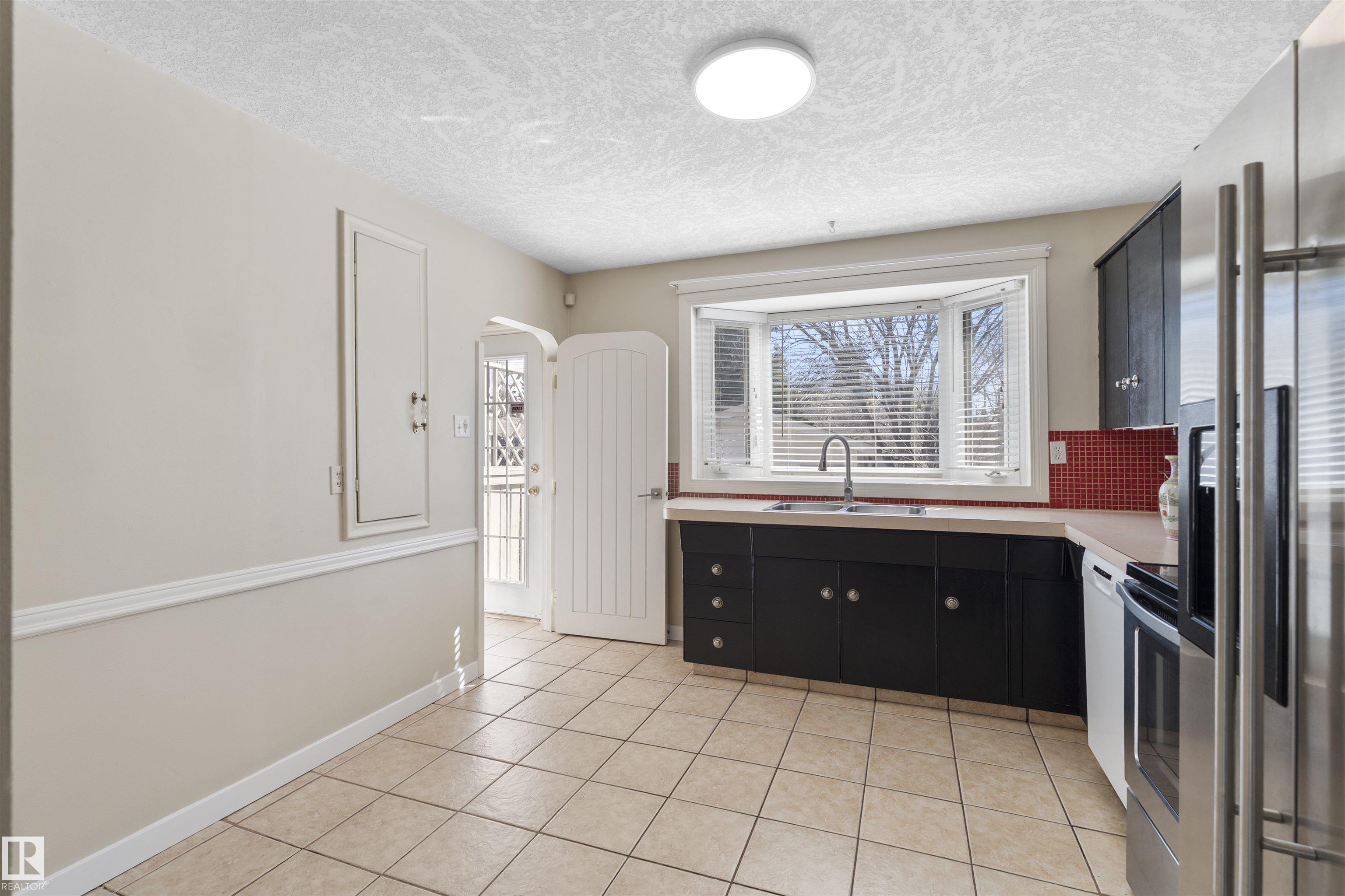 Photo 7 at 10715 135 Street NW, North Glenora, Edmonton