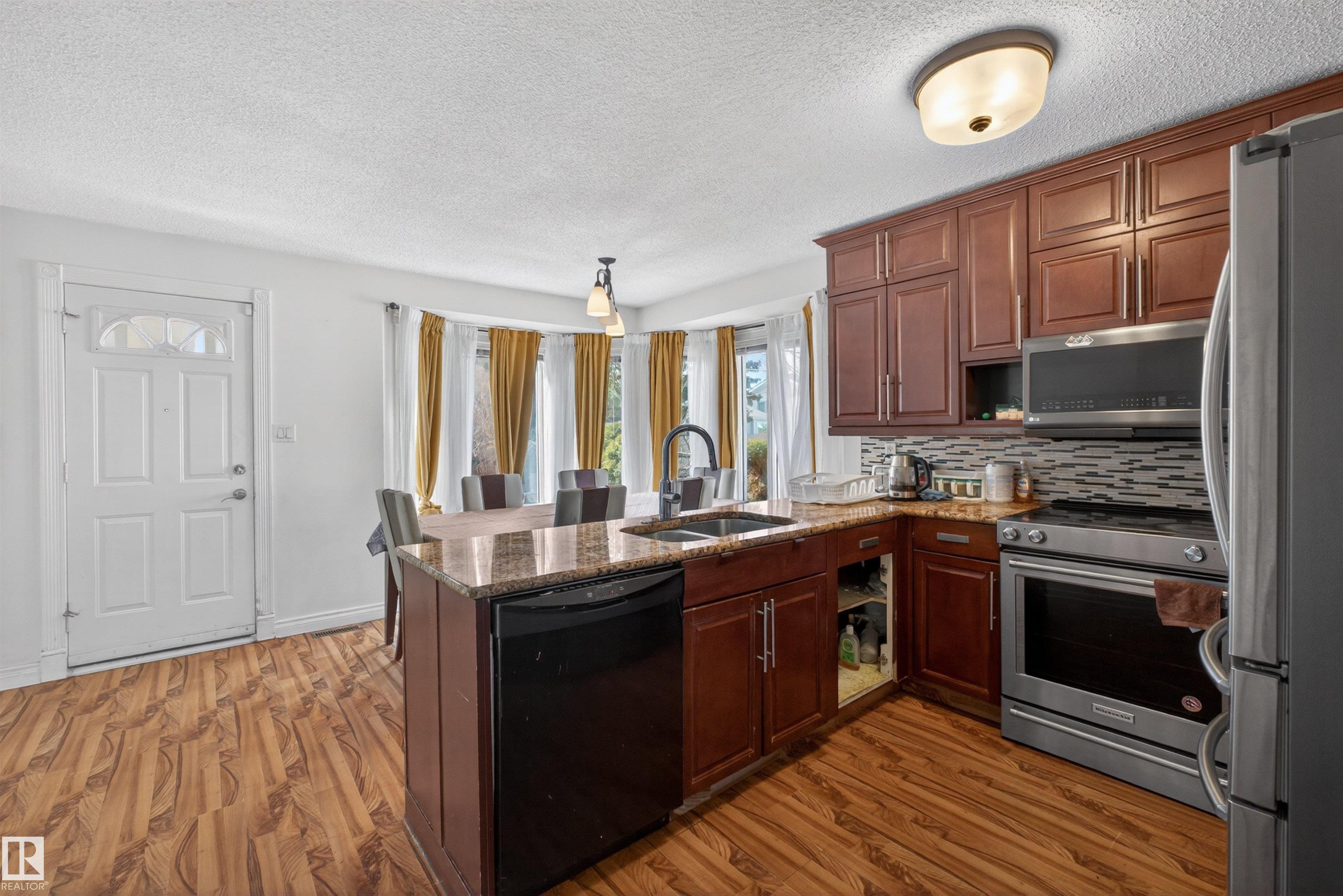 Photo 9 at 9007 169 Avenue NW, Klarvatten, Edmonton