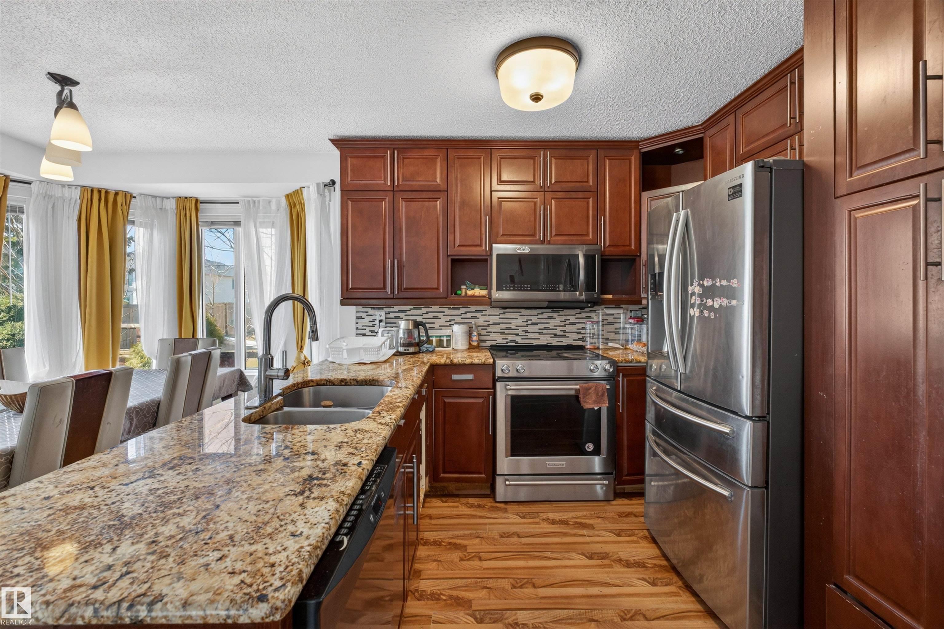 Photo 10 at 9007 169 Avenue NW, Klarvatten, Edmonton