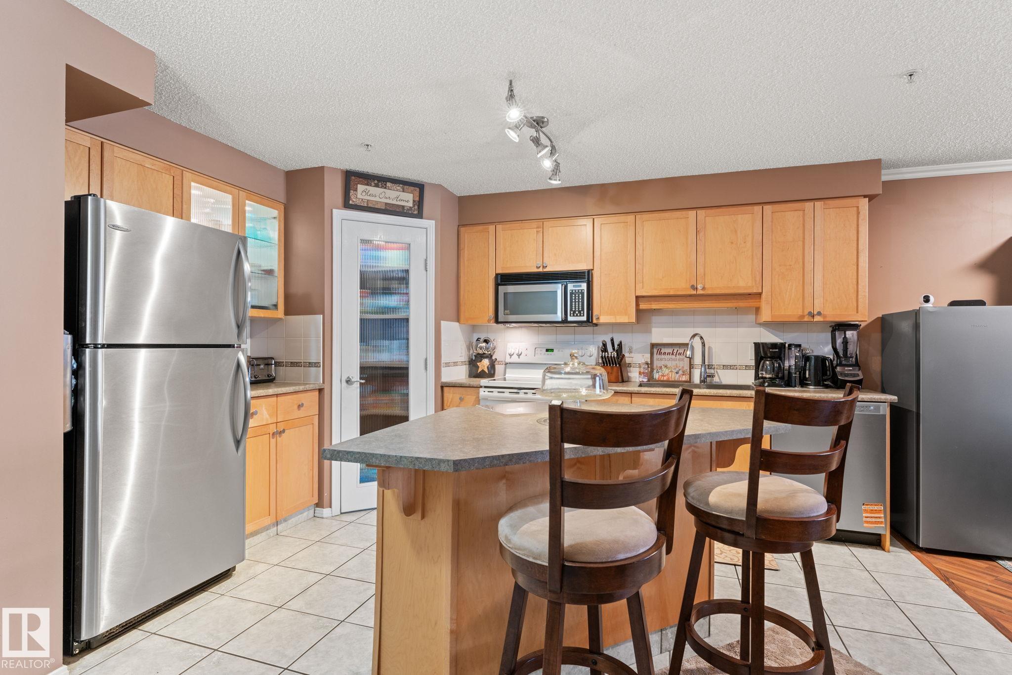 Photo 10 at 203 - 8909 100 Street NW, Strathcona, Edmonton