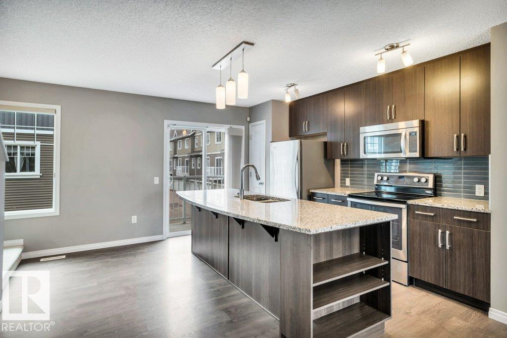 Photo 16 at 24 - 4050 Savaryn Drive SW, Summerside, Edmonton