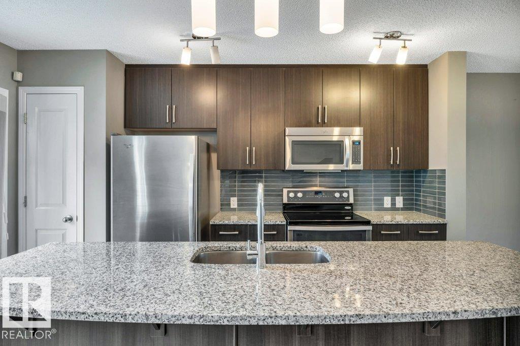 Photo 17 at 24 - 4050 Savaryn Drive SW, Summerside, Edmonton