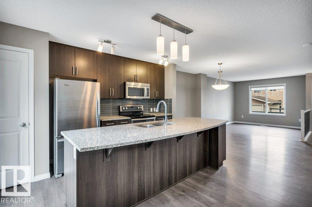 Photo 18 at 24 - 4050 Savaryn Drive SW, Summerside, Edmonton