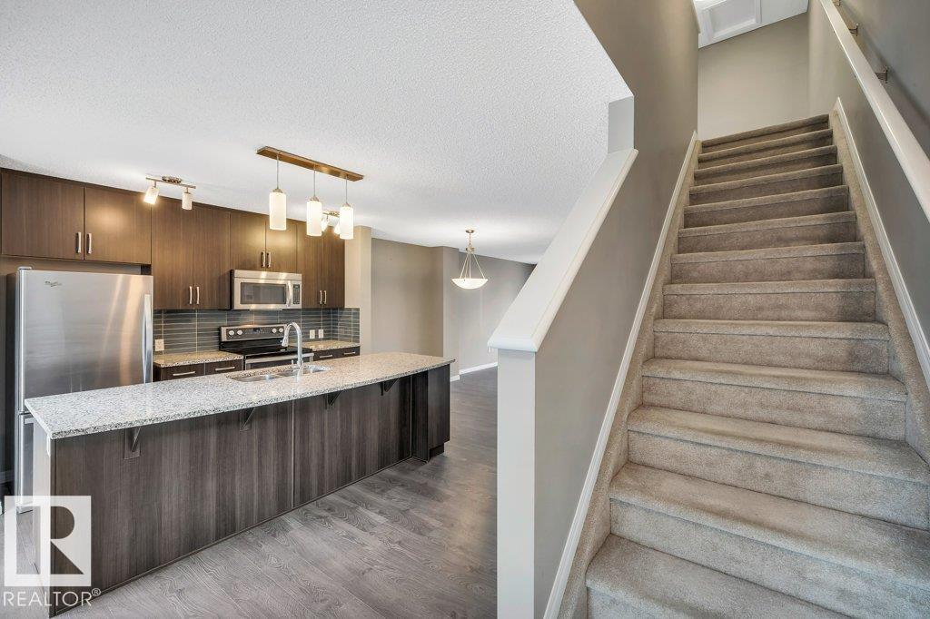 Photo 24 at 24 - 4050 Savaryn Drive SW, Summerside, Edmonton