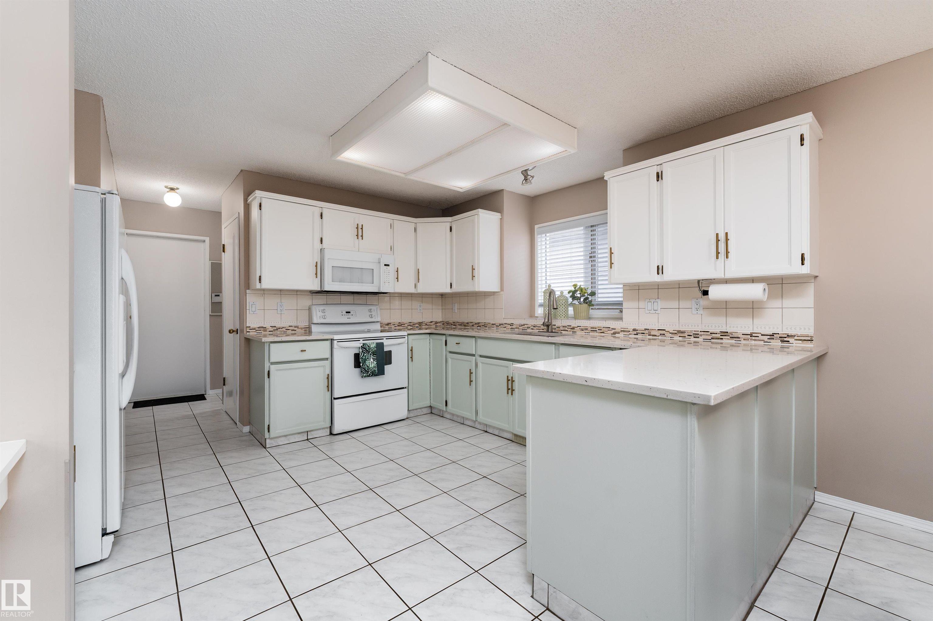 Photo 20 at 3627 146 Avenue NW, Kirkness, Edmonton