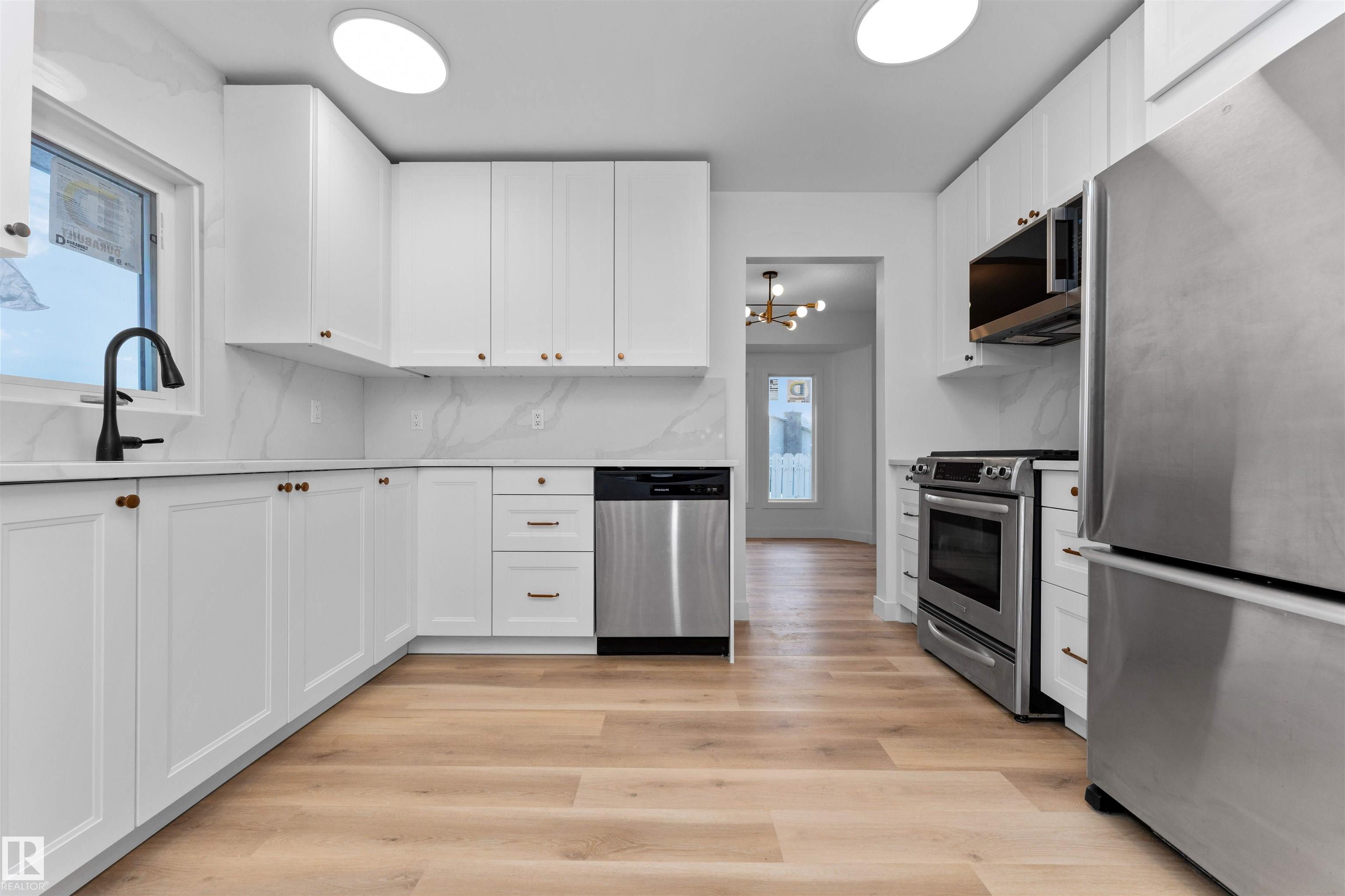 Photo 11 at 3208 130 Avenue NW, Belmont, Edmonton