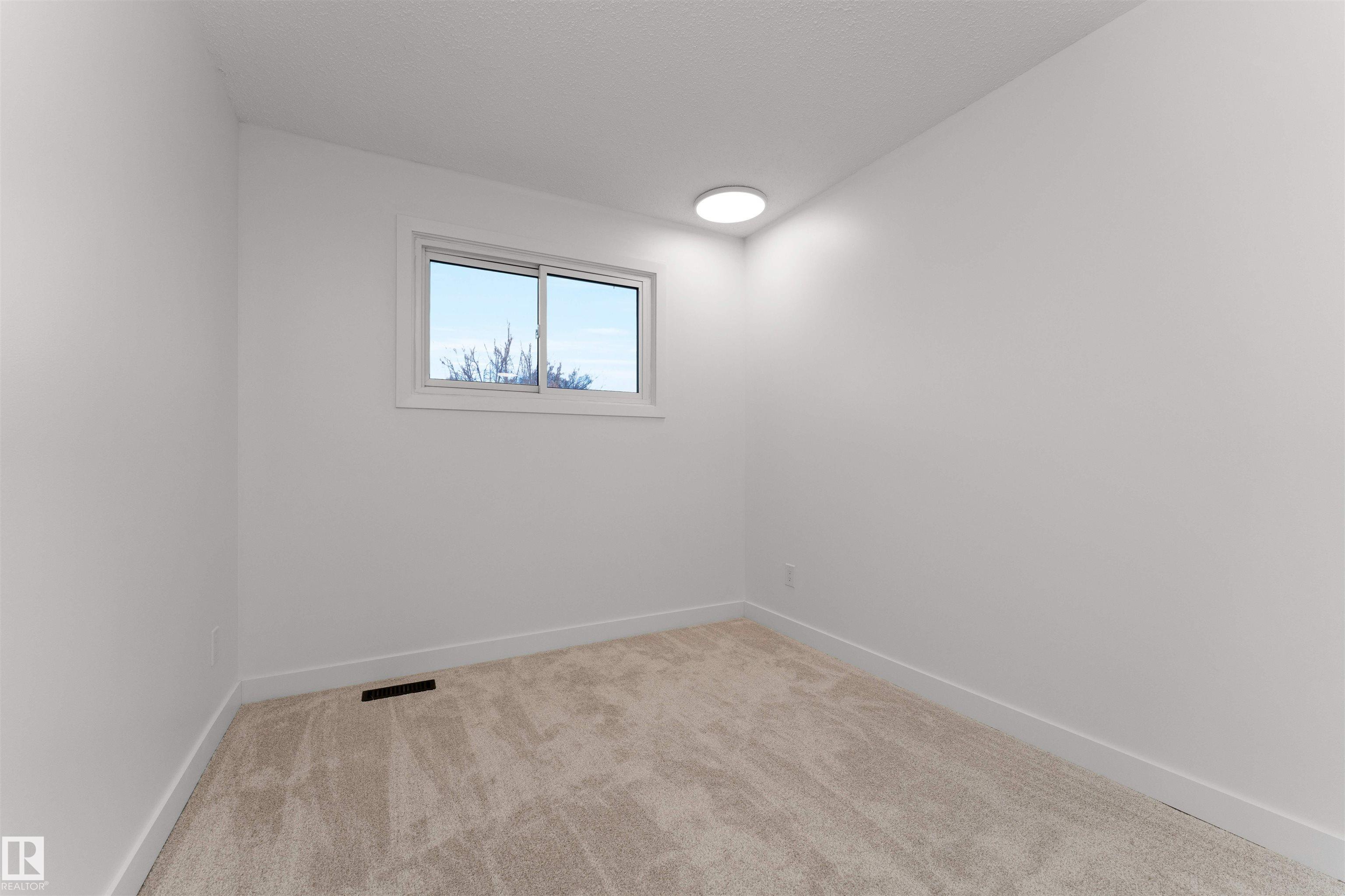 Photo 27 at 3208 130 Avenue NW, Belmont, Edmonton