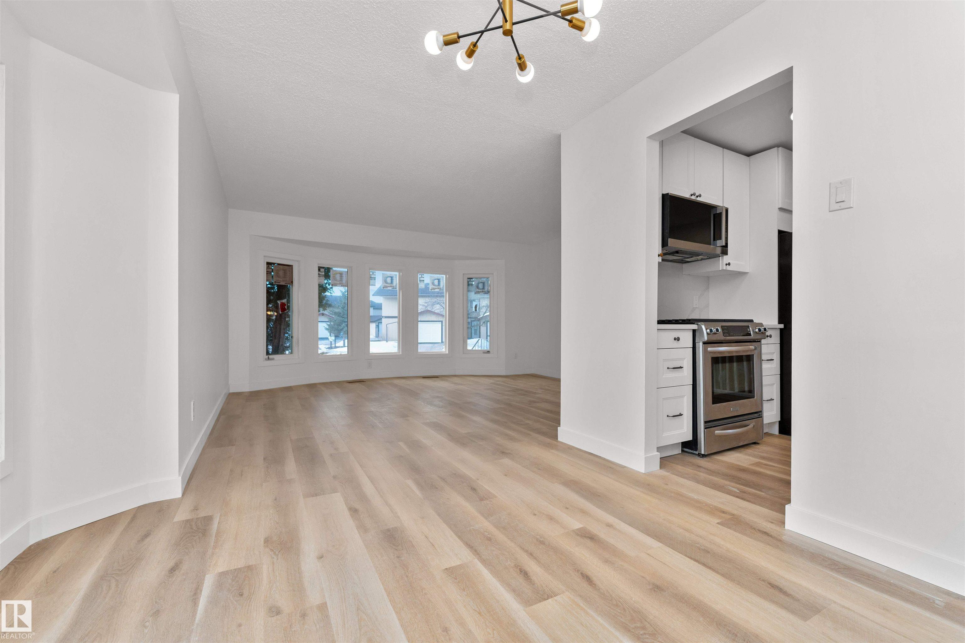 Photo 10 at 3208 130 Avenue NW, Belmont, Edmonton